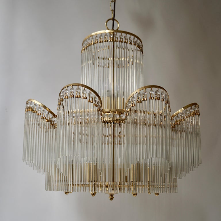 Mid-Century Modern Elegant Chandelier in Brass and Glass For Sale