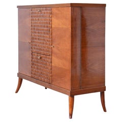 Elegant cherry bar cabinet with diamond-cut wood front by Paolo Buffa