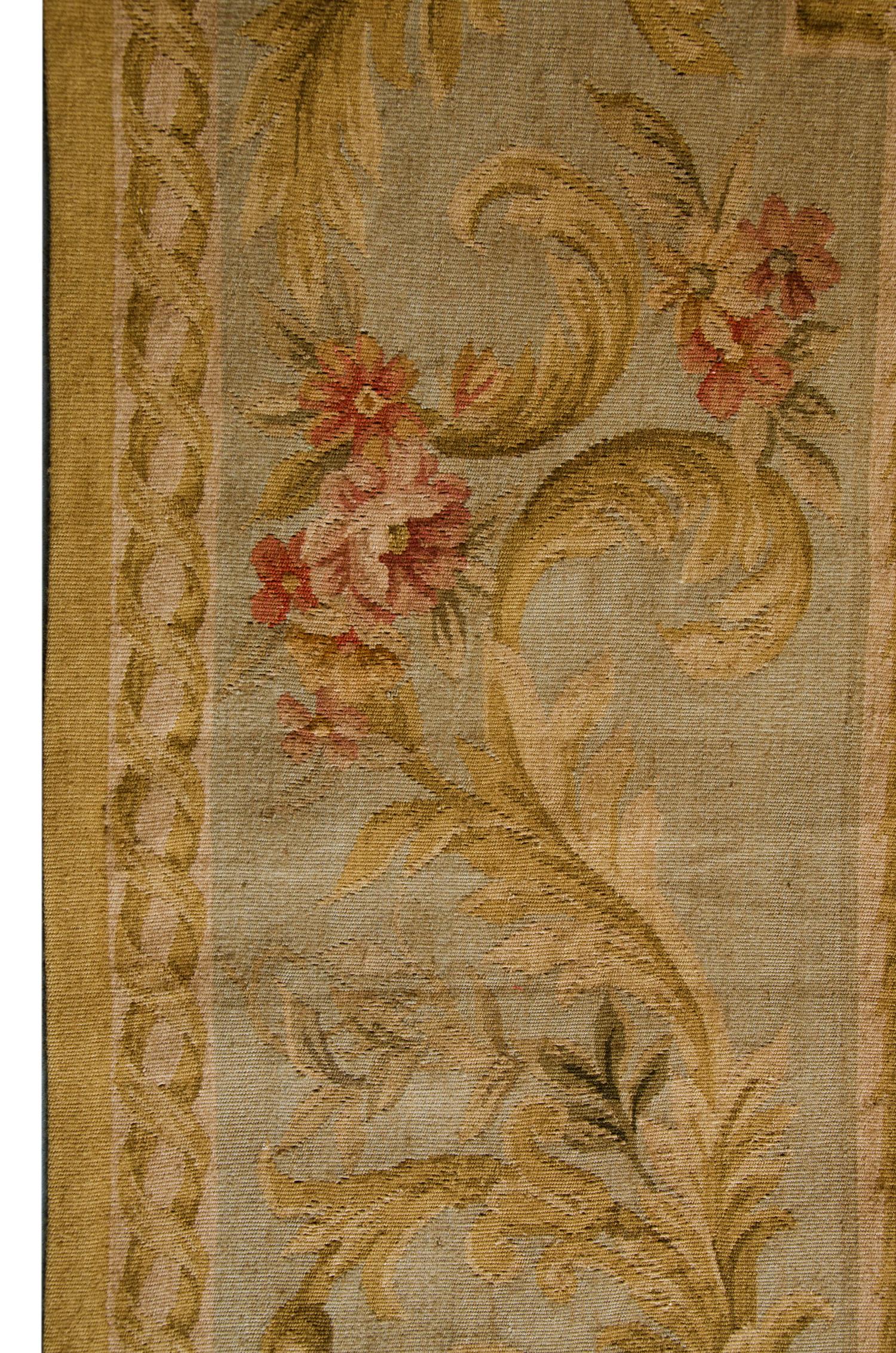This beige needlepoint Aubusson rug is a high-quality item, getting most of the attention in the rug store by clients because of the elegant color and design. These handmade elegant Chinese Aubusson floor rugs have soft, subtle shades of colors with