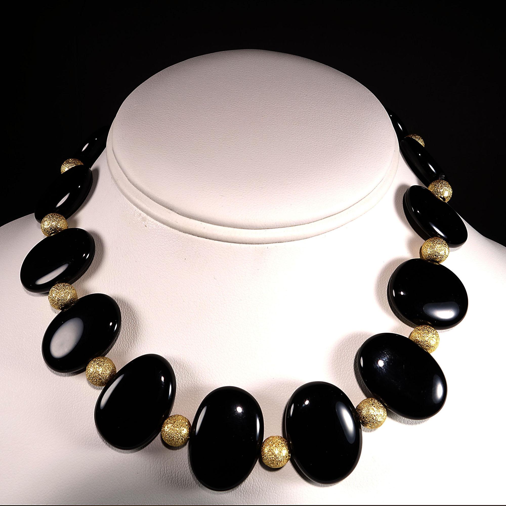 Unique choker necklace of oval Black Onyx tablets with frosted gold accents. This handmade choker necklace is 14.5 inches in length, just right to sit at the base of your neck.  The highly polished oval Black Onyx tablets are approximately 24x16mm.