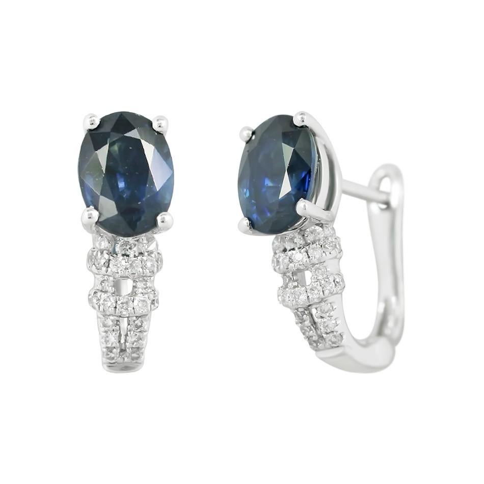 Ring White Gold 14 K (Matching Earrings Available)

Diamond 6-RND57-0,11-4/7A
Diamond 82-RND57-0,29-4/7A
Blue Sapphire 1-Oval-1,38 Т(4)/4A

Weight 2.8 grams
Size 16.5
With a heritage of ancient fine Swiss jewelry traditions, NATKINA is a Geneva