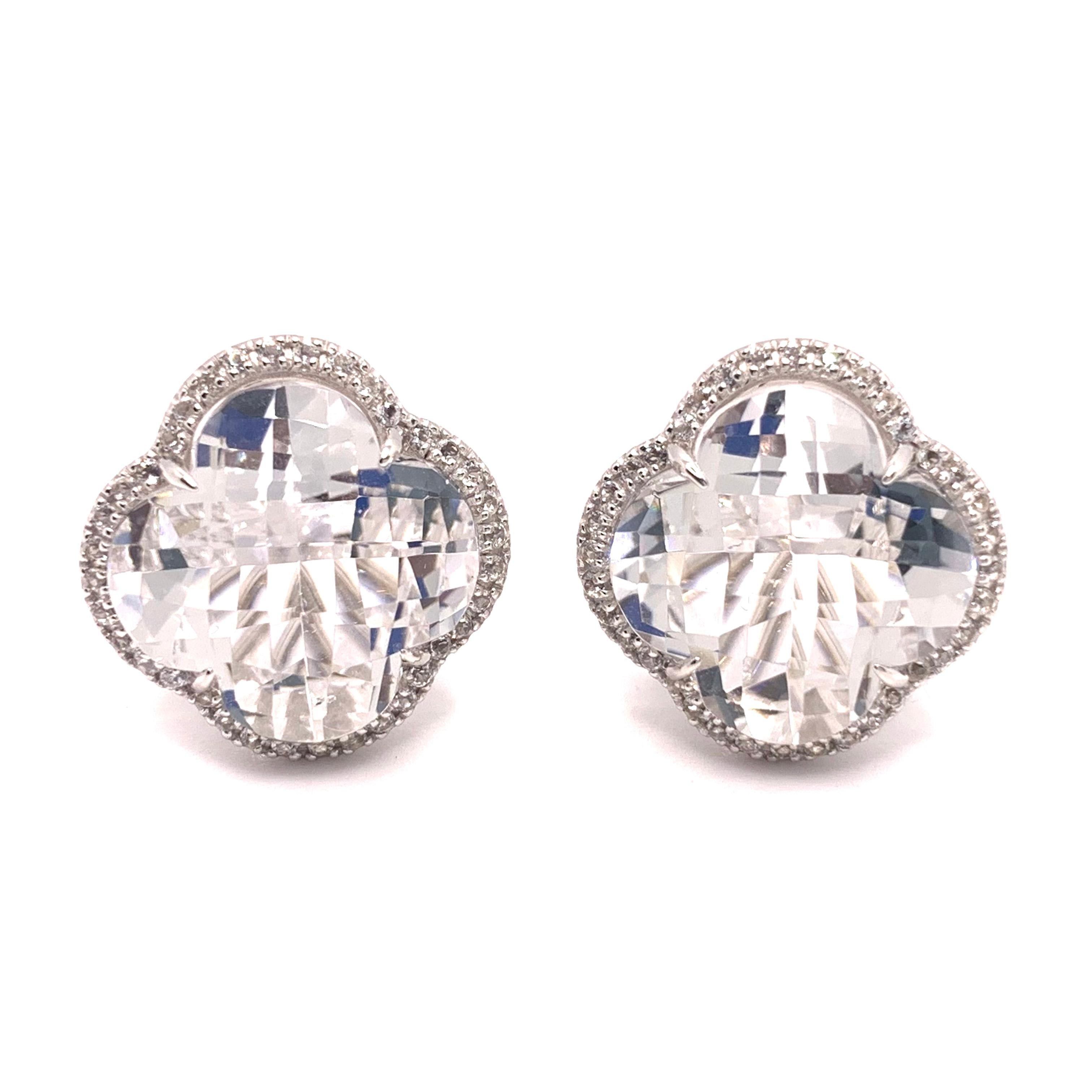 Elegant Clover Shape Clear Quartz Button Earrings

These stunning pair of button earrings feature a pair of clover shape checkerboard-cut clear quartz (aka rock crystal), surrounded with round white topaz, handset in platinum rhodium plated sterling