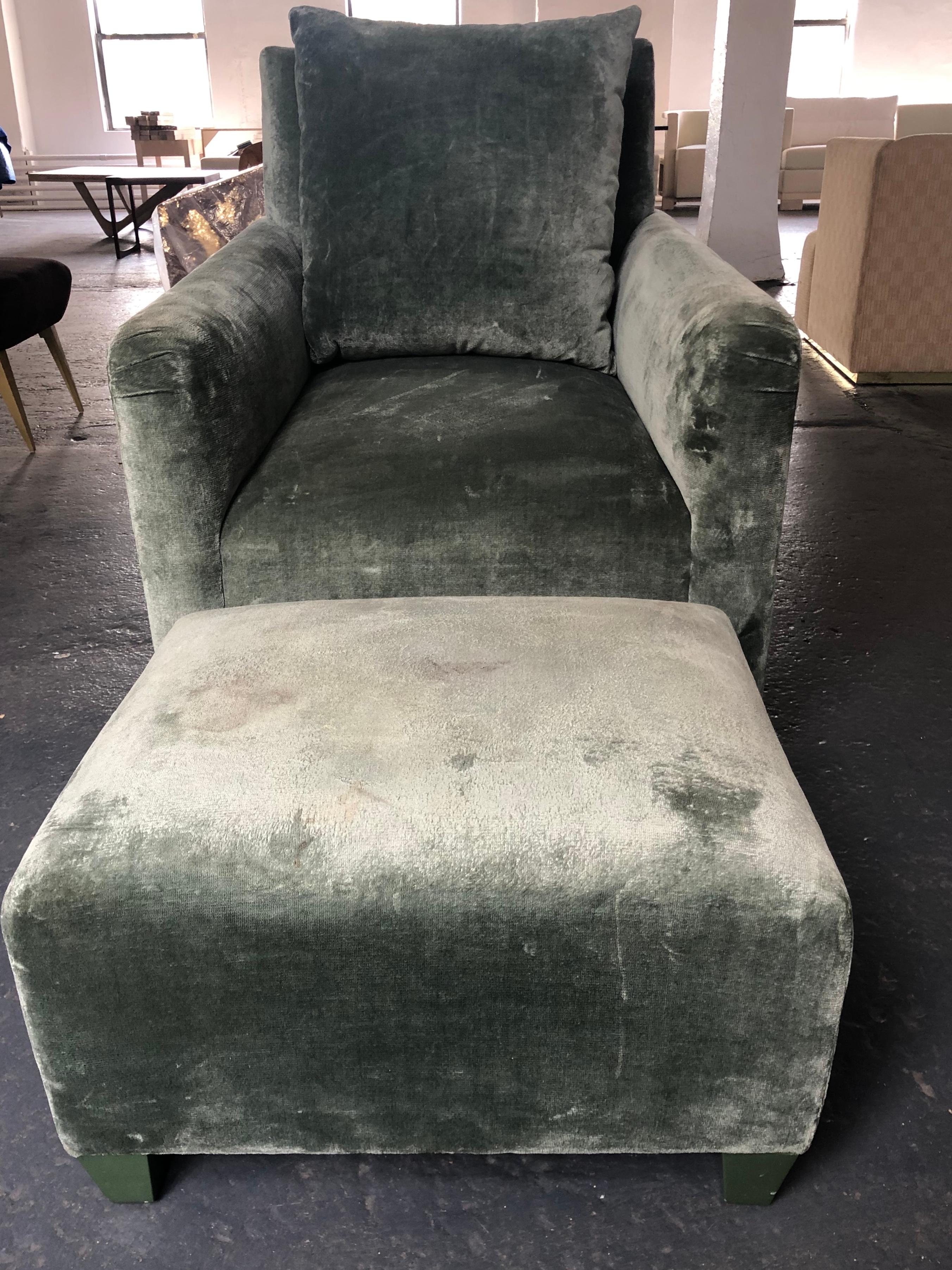 Elegant club chair and ottoman by Geoffrey Bradfield in a moss green velour. The sleek and very comfortable club chair will compliment any style. The matching ottoman is 23