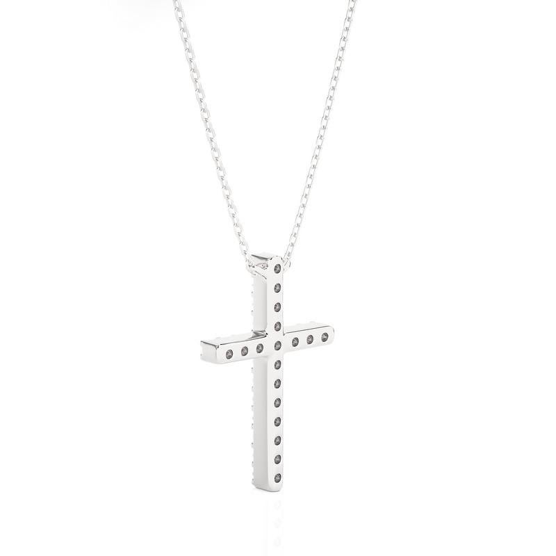 Carat Weight: This exquisite cross pendant boasts a total carat weight of 0.09 carats, offering a subtle yet captivating sparkle.

Diamonds: Adorning the cross pendant are 18 meticulously chosen diamonds, selected for their brilliance and quality.