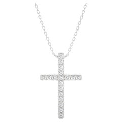 Pendentif croix élégant : diamants 0,09 carat en or blanc 14 carats