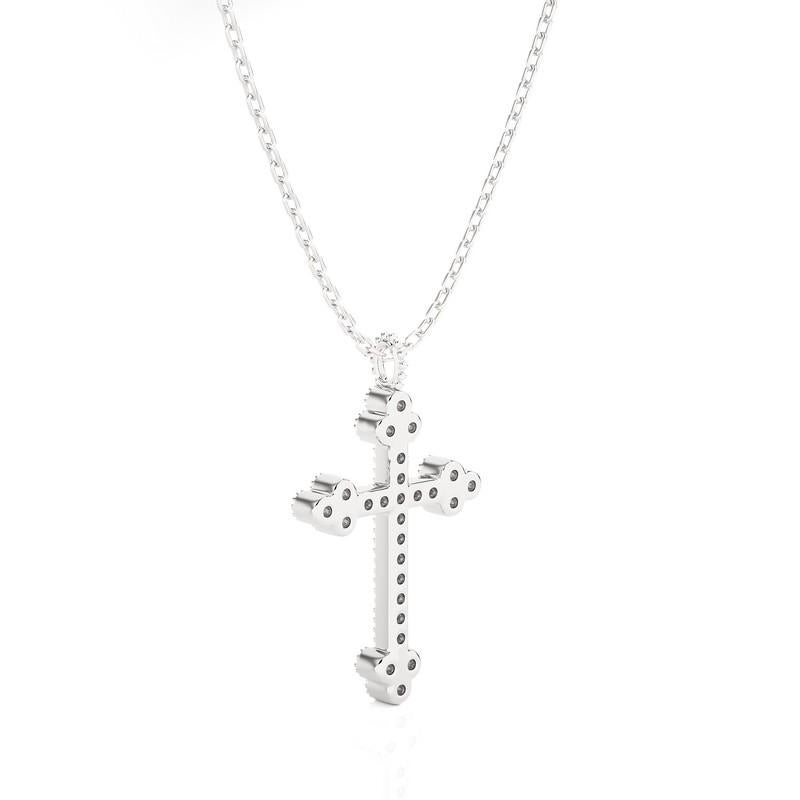 Carat Weight: This exquisite cross pendant boasts a total carat weight of 0.13 carats, offering a subtle yet captivating sparkle.

Diamonds: Adorning the cross pendant are 26 meticulously chosen diamonds, selected for their brilliance and quality.