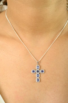 Elegant Cross Pendant in 14K White Gold with Blue Sapphires and Diamond Halo