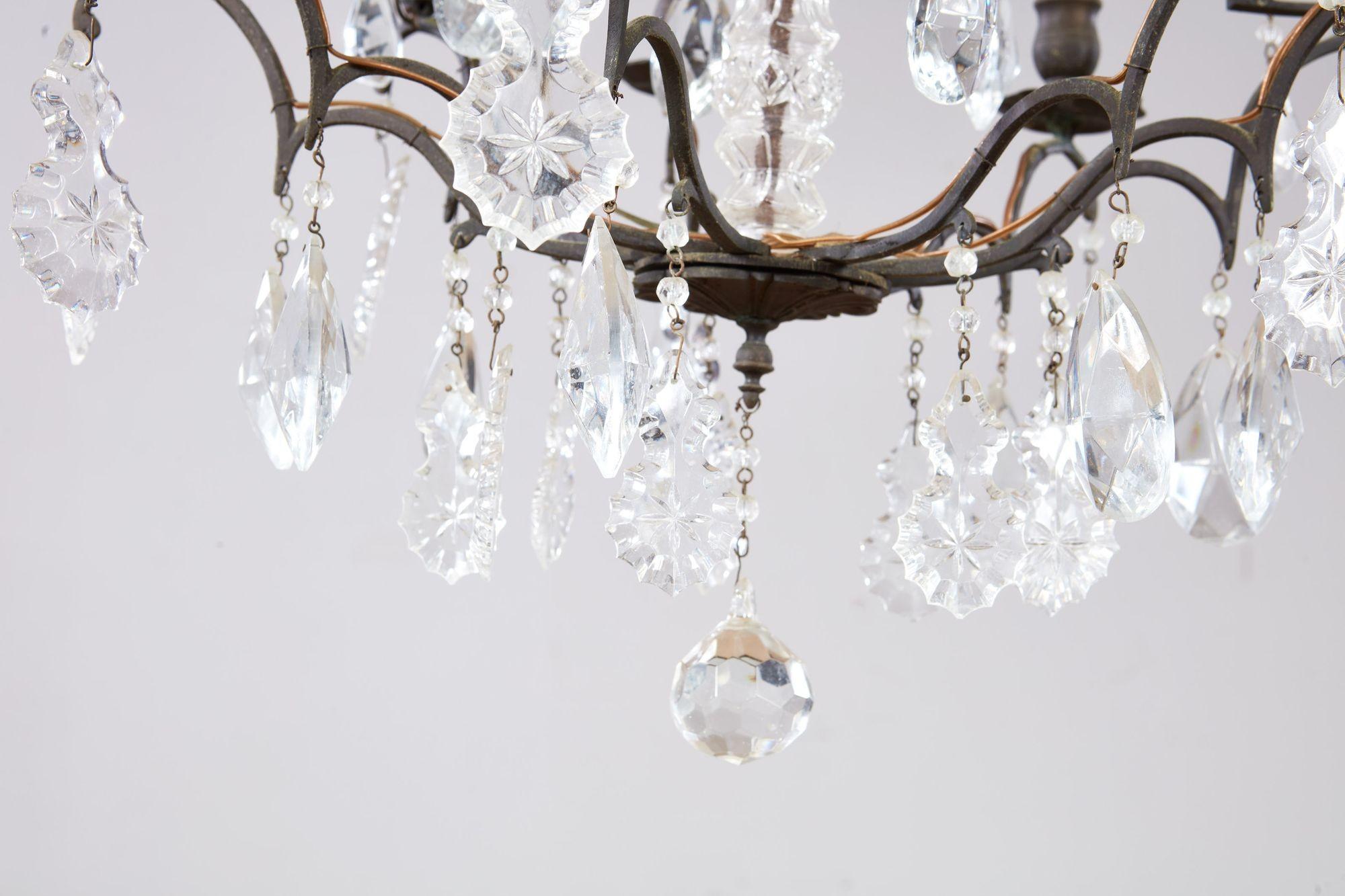 Elegant Crystal and Bronze Chandelier For Sale 3