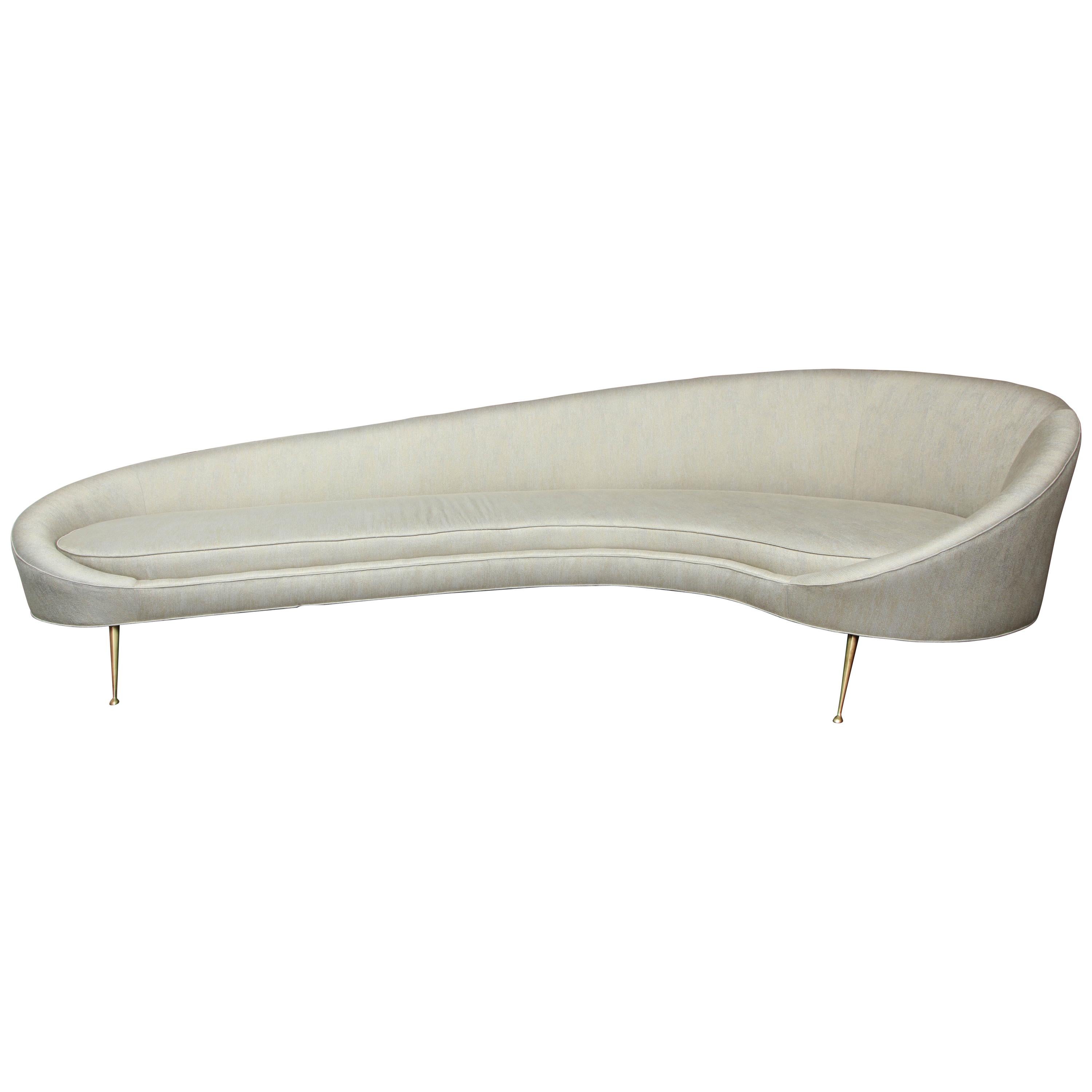 Elegant Curved Sofa in Custom Upholstery with Brass Legs For Sale