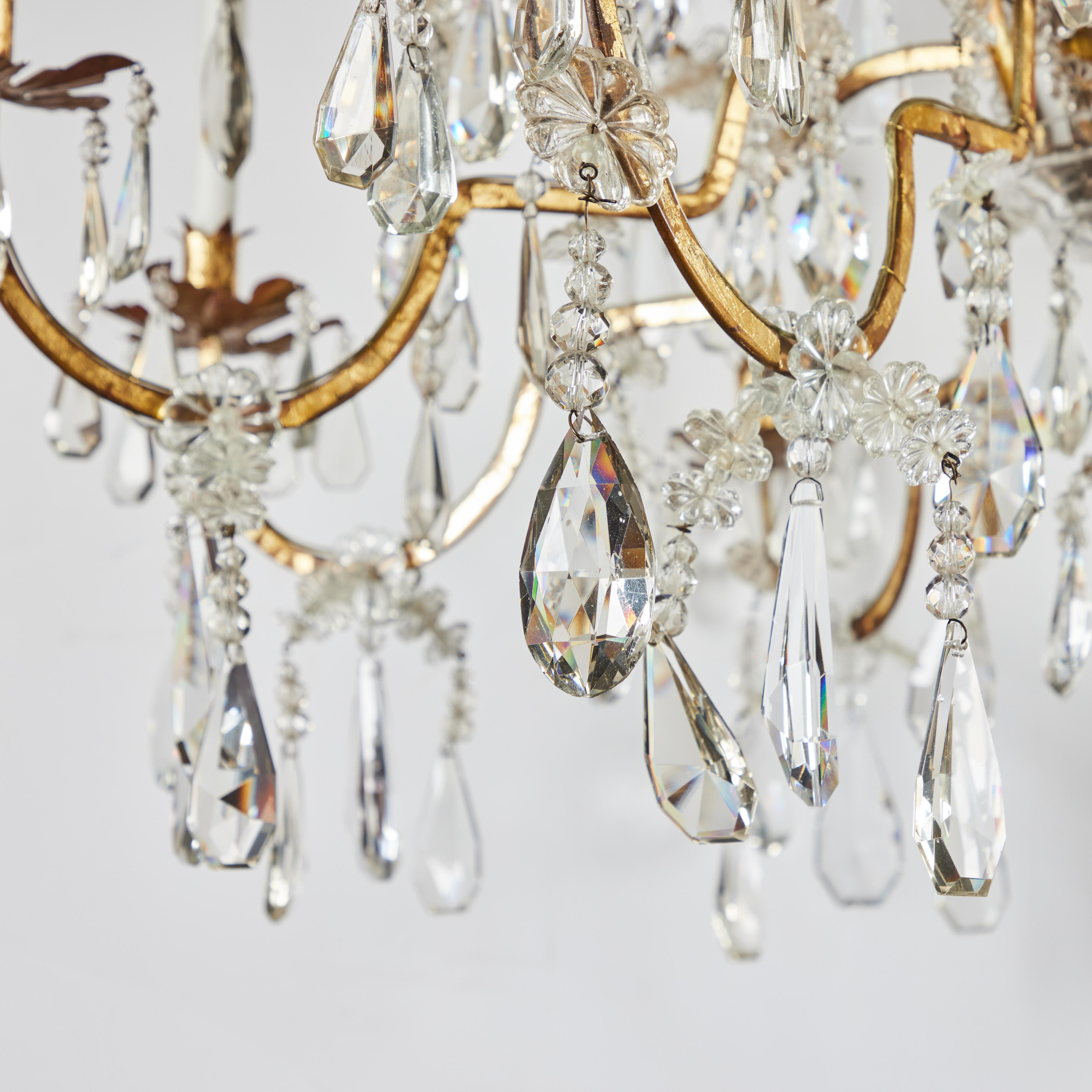Gilt Elegant Cut Crystal and Gilded Tole Chandelier For Sale
