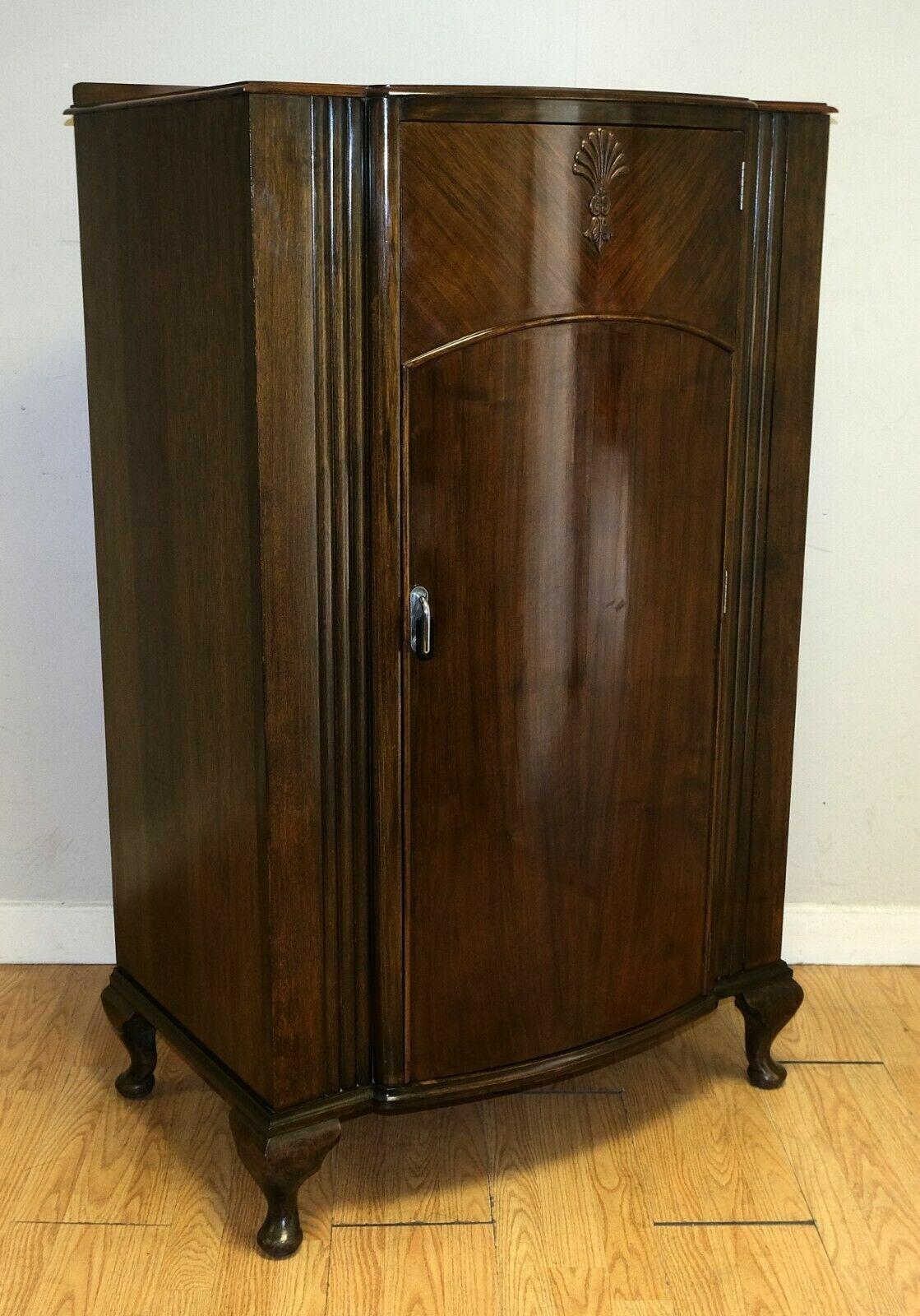 We are delighted to offer for sale this elegant C.W.S Cabinet Works Birmingham walnut ladies wardrobe on cabriole legs.

This piece is a part of a suite, with a dressing table, a bed and a double wardrobe, however, this sale is just for the