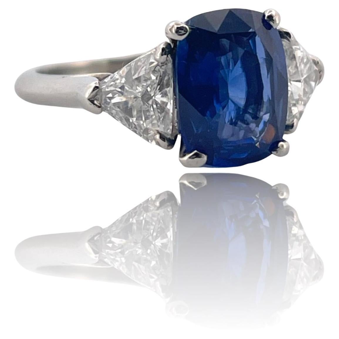 Elegant Cylon Sapphire Ring with Trillion Cut Diamond in Platinum