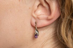Elegant Dangle Earrings with Amethysts and Diamonds