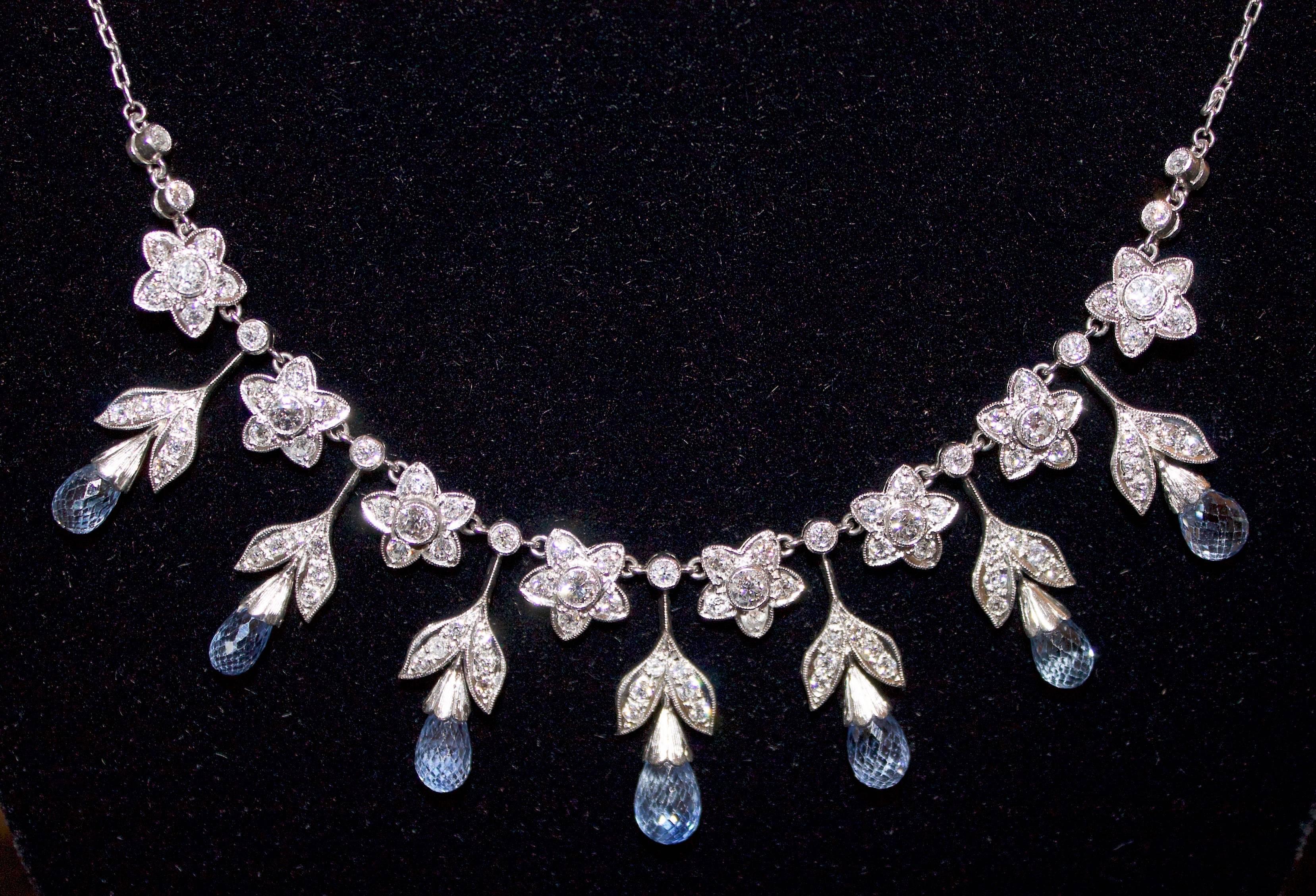 Elegant Dangling Sapphire and Diamond 1930's Necklace 
Seven Briolette  Sapphires weighing 6.50 carats (approximately)  
Old European diamonds weighing 3.75 carats (approximately)  
As you Dance the Bottom Pieces Sway Back and Forth
Dancing Not
