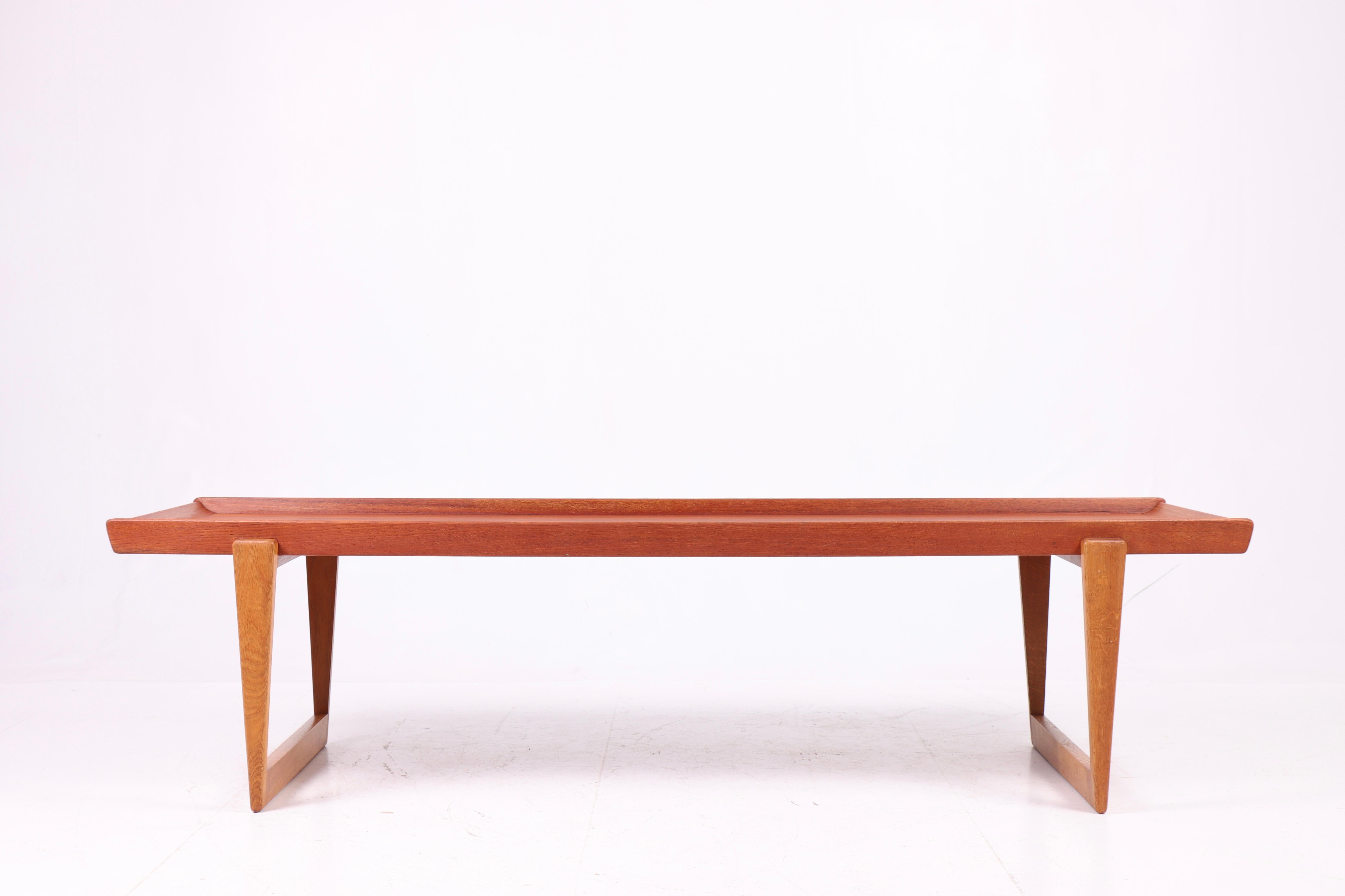 Scandinavian Modern Elegant Danish 1960s Coffee Table in Teak with Solid Oak Legs - Mid-Century Mode