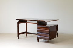 Elegant desk with drawers and book case