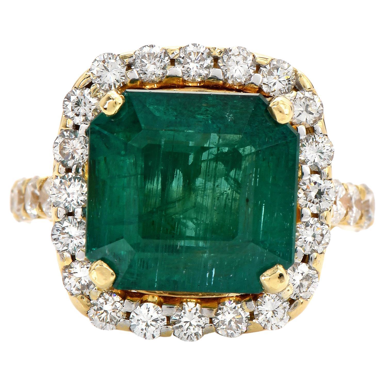 Imagine the sheer elegance and timeless beauty that awaits you with the Large Emerald and diamond ring.
The mesmerizing green hue of the center Genuine Emerald, Square emerald cut, weighing 8.08 carats;  combined with the brilliance of the