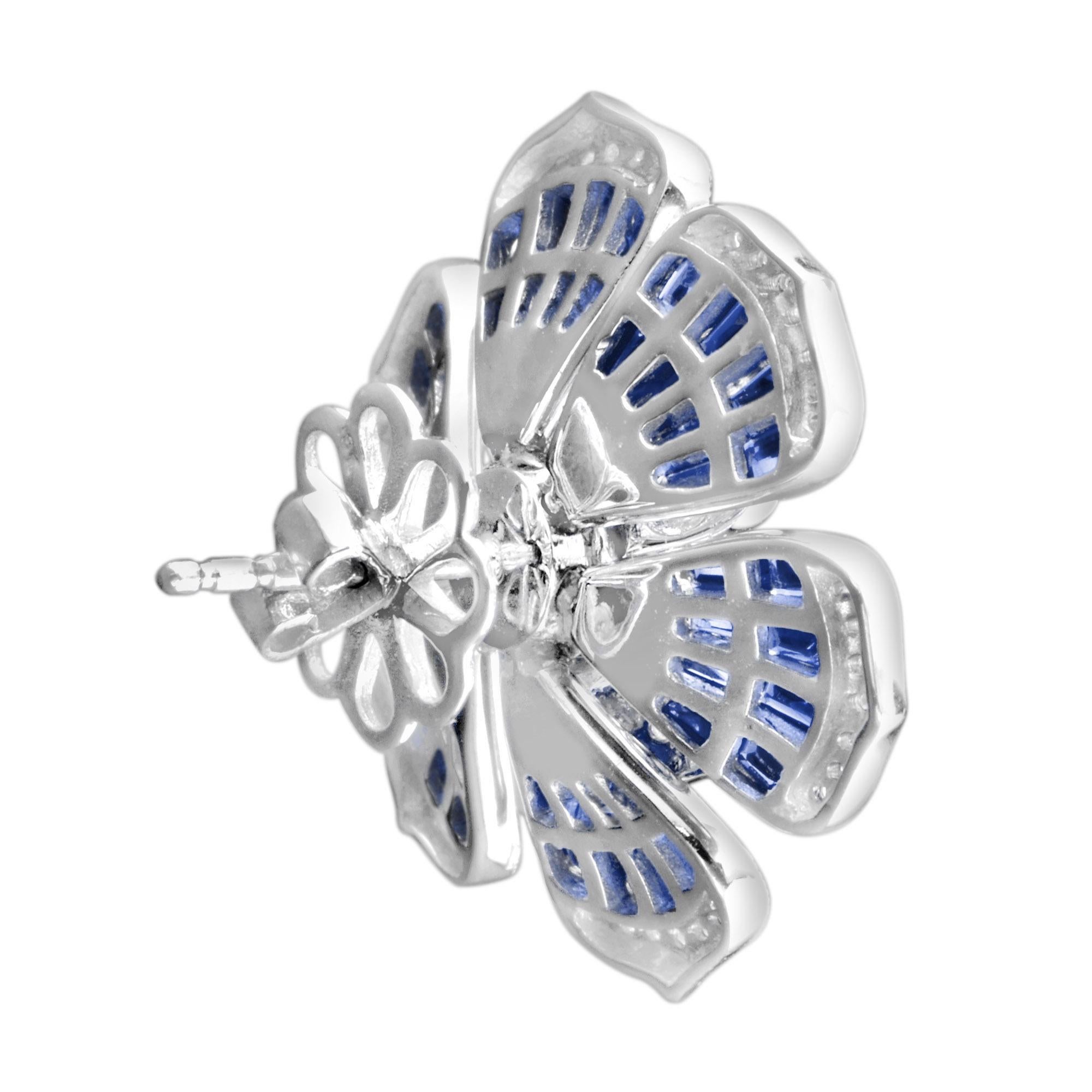 Round Cut Elegant Diamond and Blue Sapphire Floral Stud Earrings in 18K White Gold For Sale