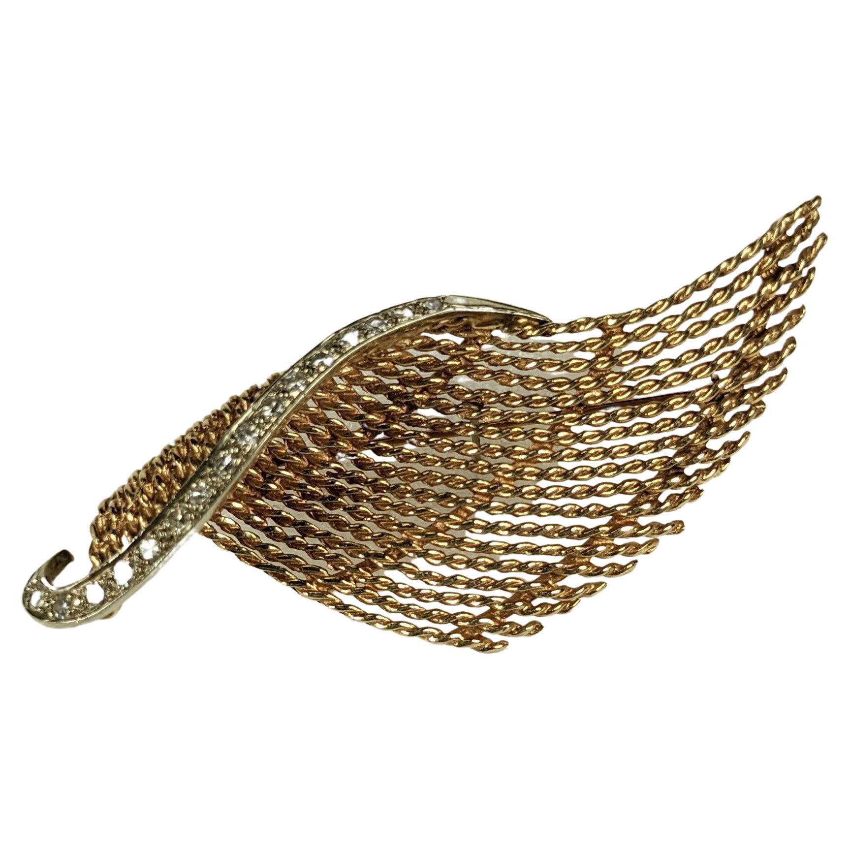 Elegant Diamond and Gold Wave Brooch For Sale