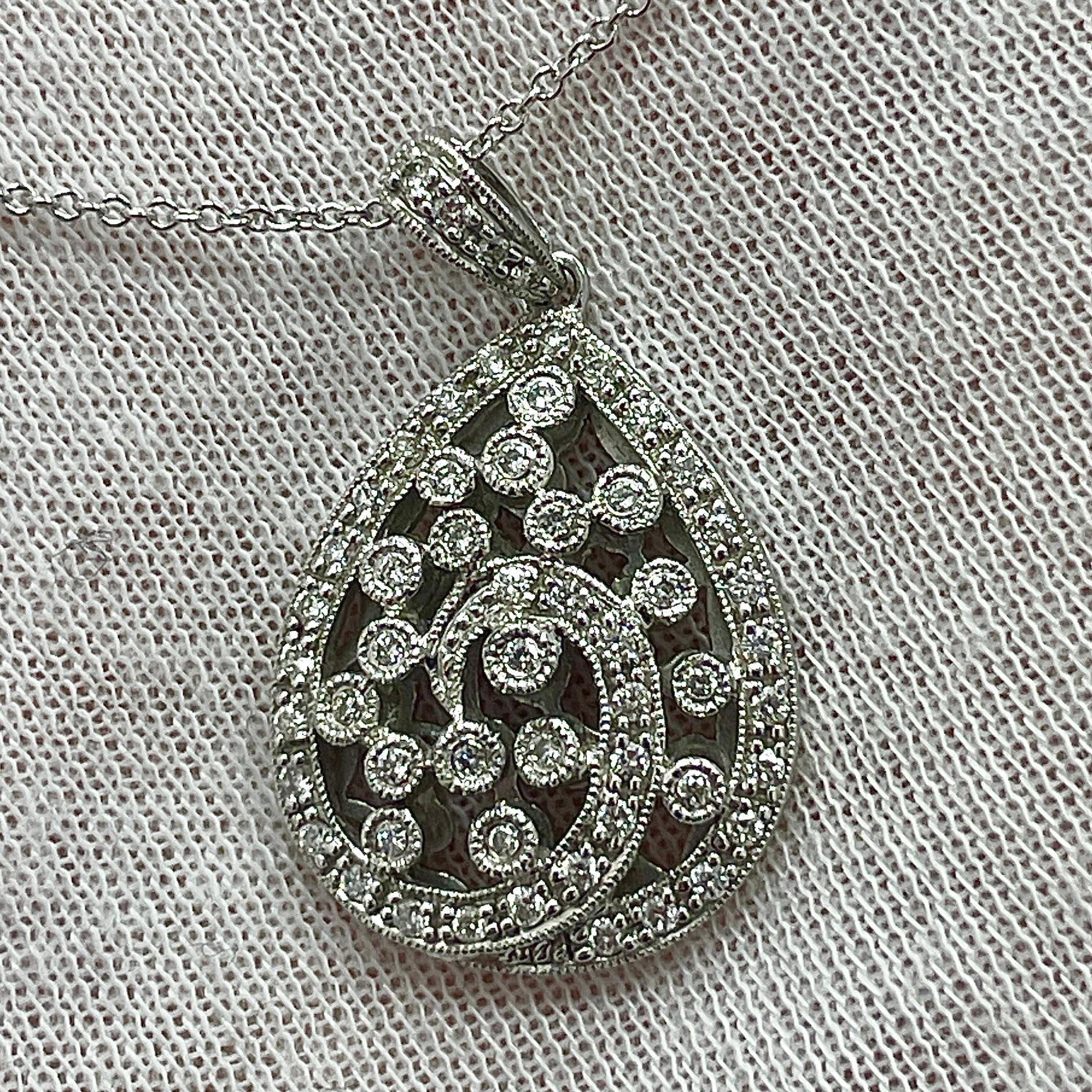 An intricately designed pendant with 0.37Ct of diamonds set in white gold. 