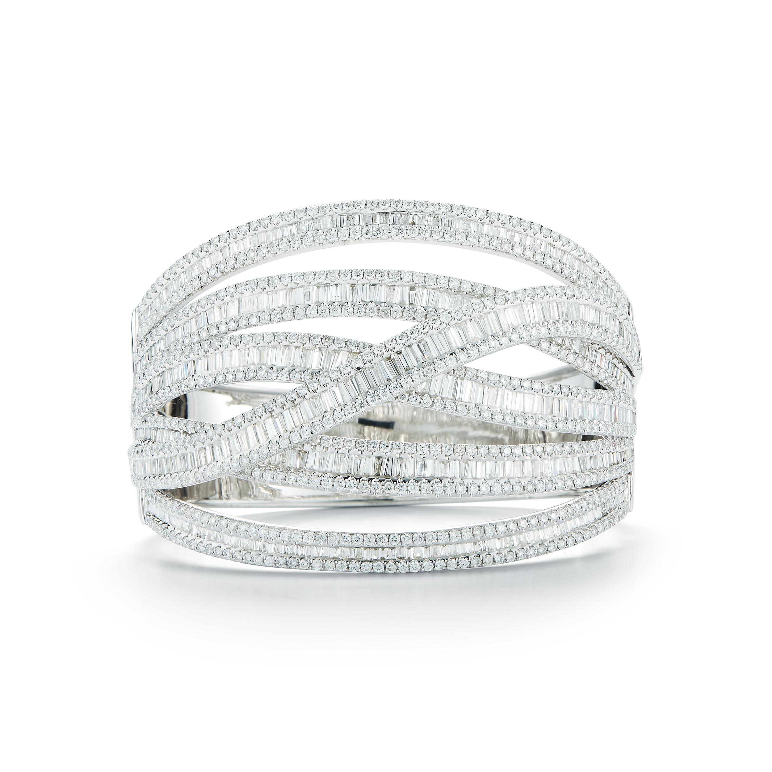 Elegant Diamond Bracelet, made of 18k white gold, set with 7.74 carat of round diamond and 5.10 carat of baguettes Diamond. All Diamonds are F color VS clarity. Total weight of Diamonds 12.84 carat.