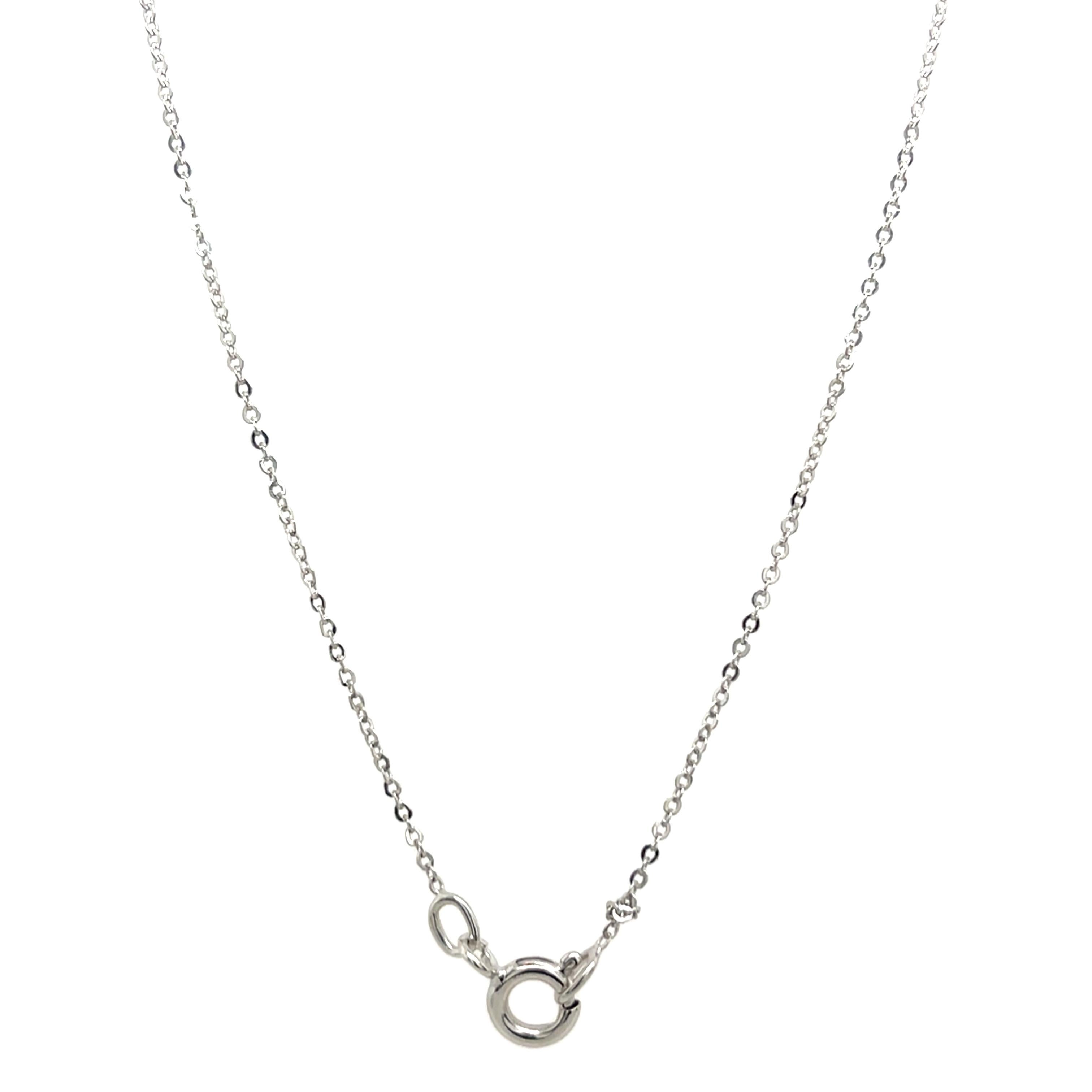 This elegant pendant features a graceful drop design, 
set with 8 round diamonds, adding brilliance and sophistication. Crafted in 18ct white gold, it is perfect for enhancing any evening look or special occasion. 

Chain Length: 15