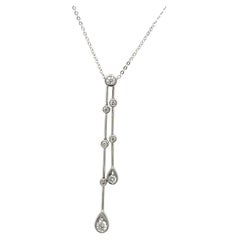Elegant Diamond Drop Pendant Set In 18ct White Gold