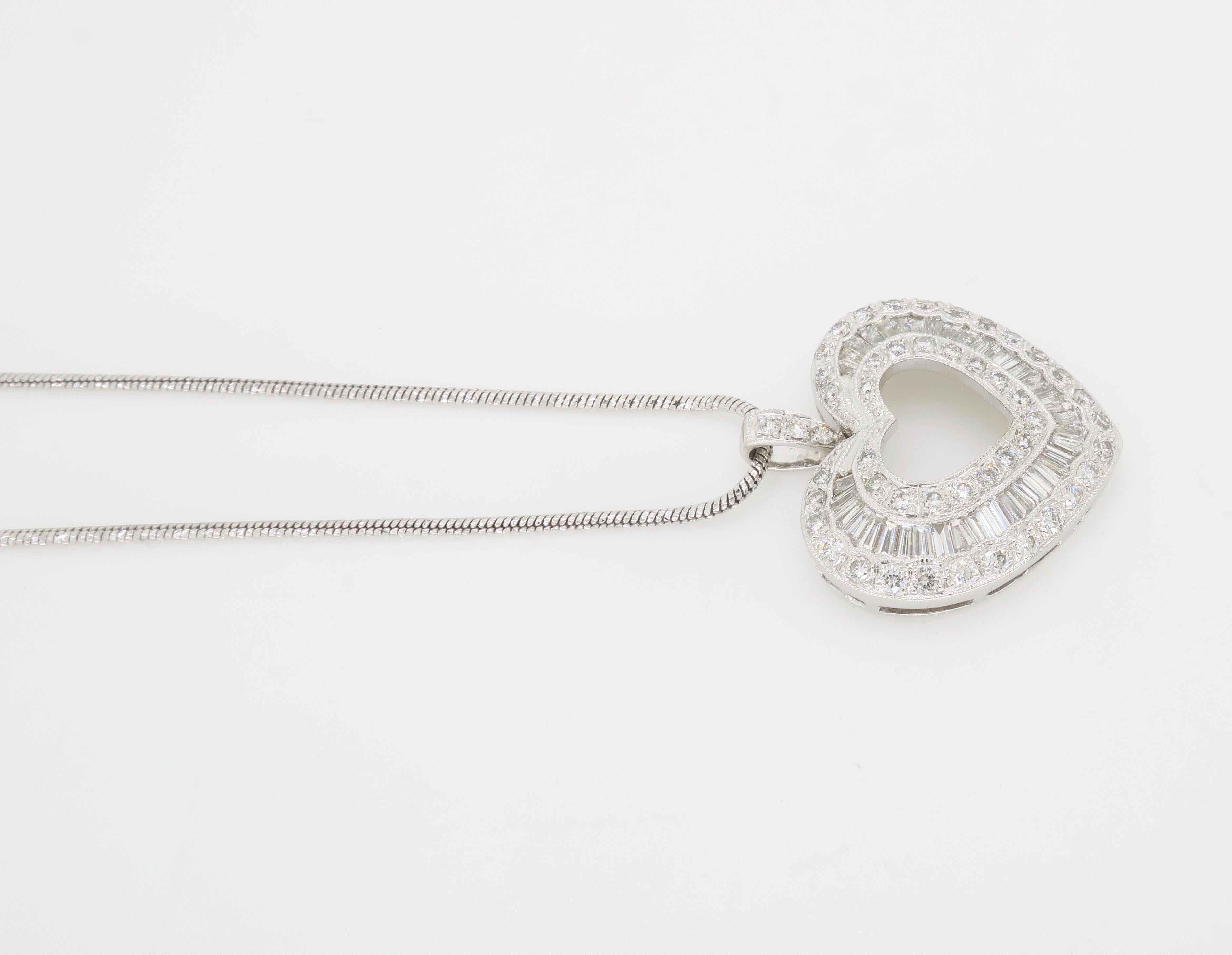 Elegant diamond heart necklace made with Baguette and Round diamonds on an adjustable 23