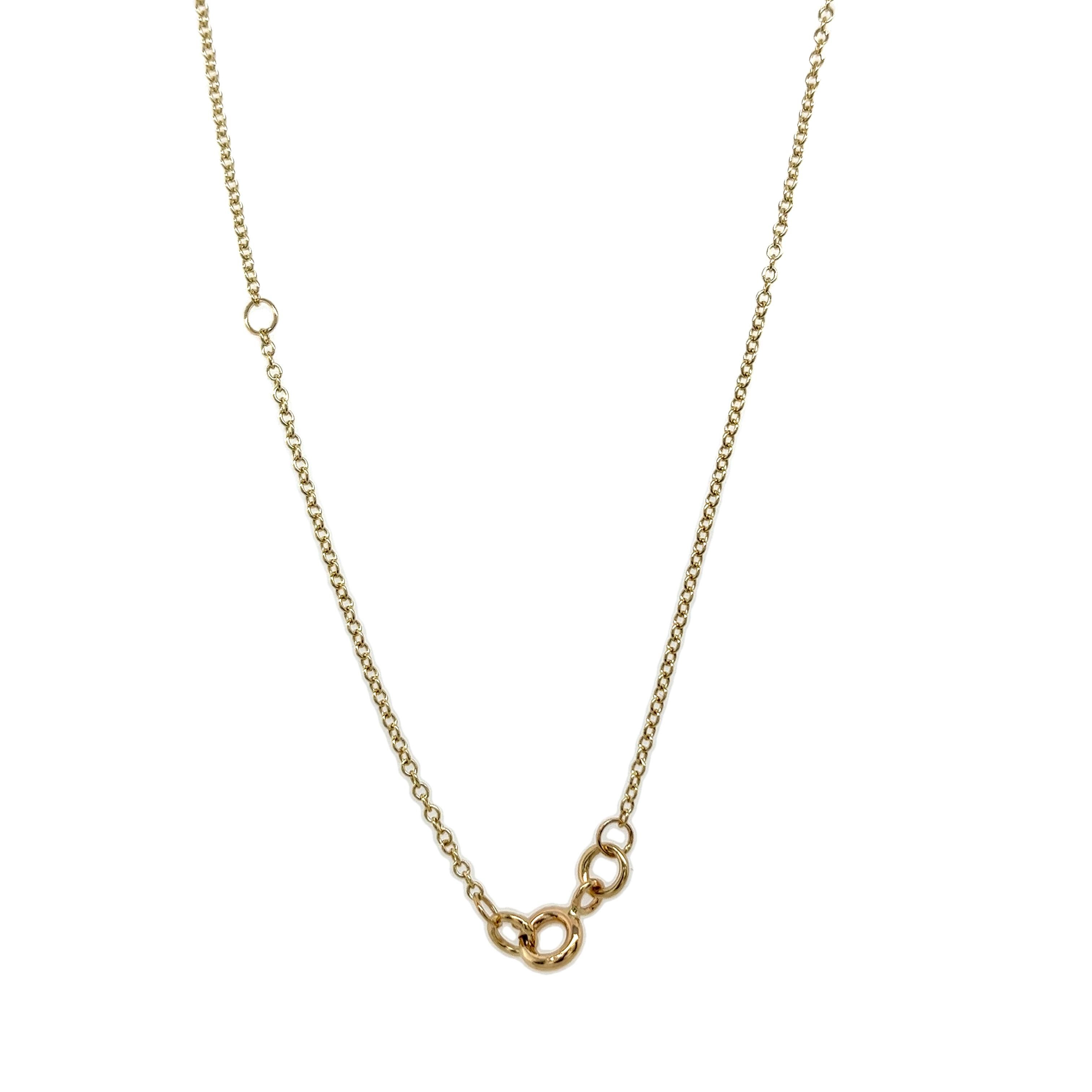 Ce magnifique pendentif en forme de flocon de neige en diamant 

est sertie d'un diamant rond de taille brillant de 0,44ct en or jaune et blanc 18ct, 

Le pendentif est suspendu à une chaîne en or jaune et blanc 18ct. 

qui mesure 15 pouces. (le