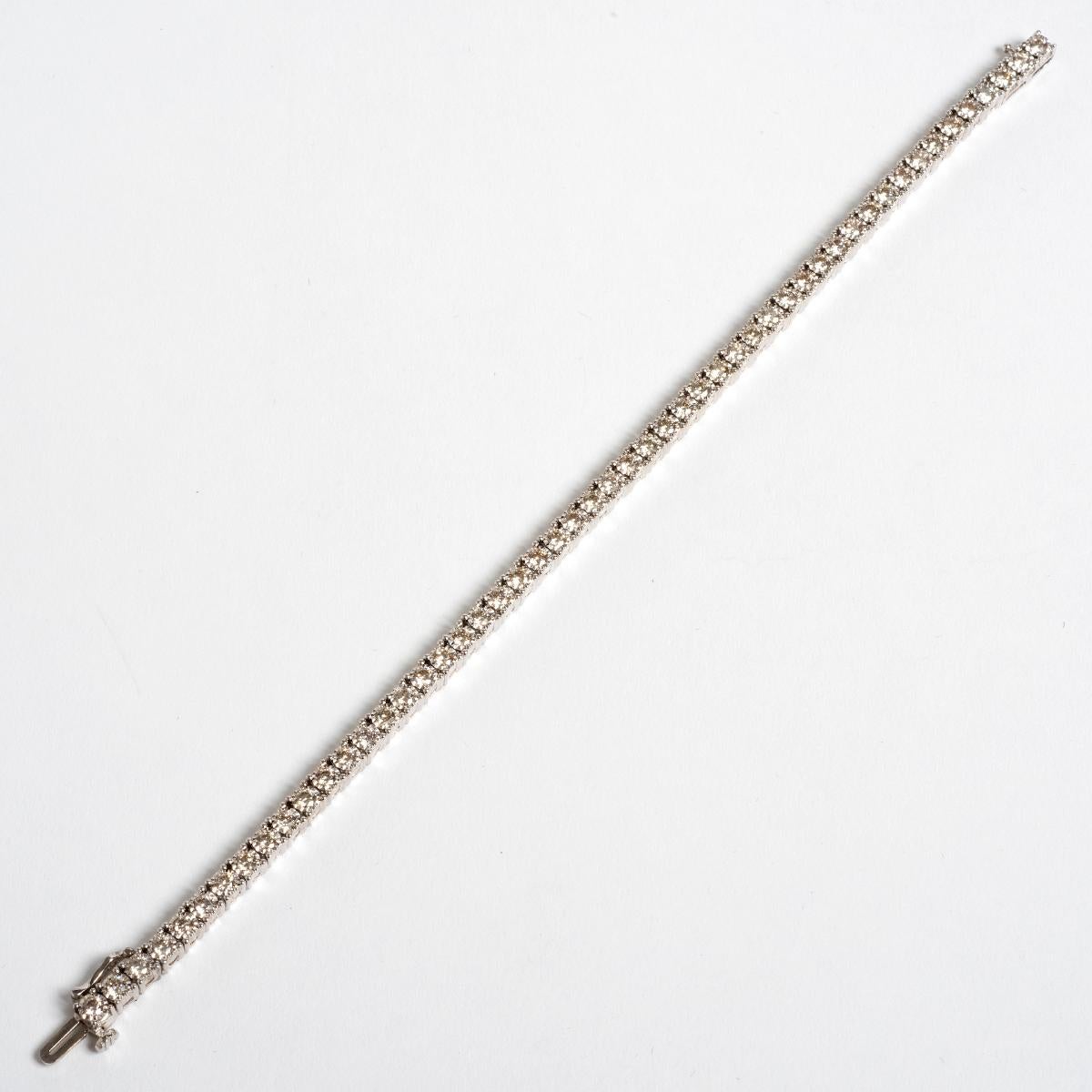 A unique piece within our carefully curated Vintage & Prestige fine jewellery collection, we are delighted to present the following:

This elegant diamond line bracelet is set in 9ct white gold. Diamond weight approx 3.50ct and measures 190mm.