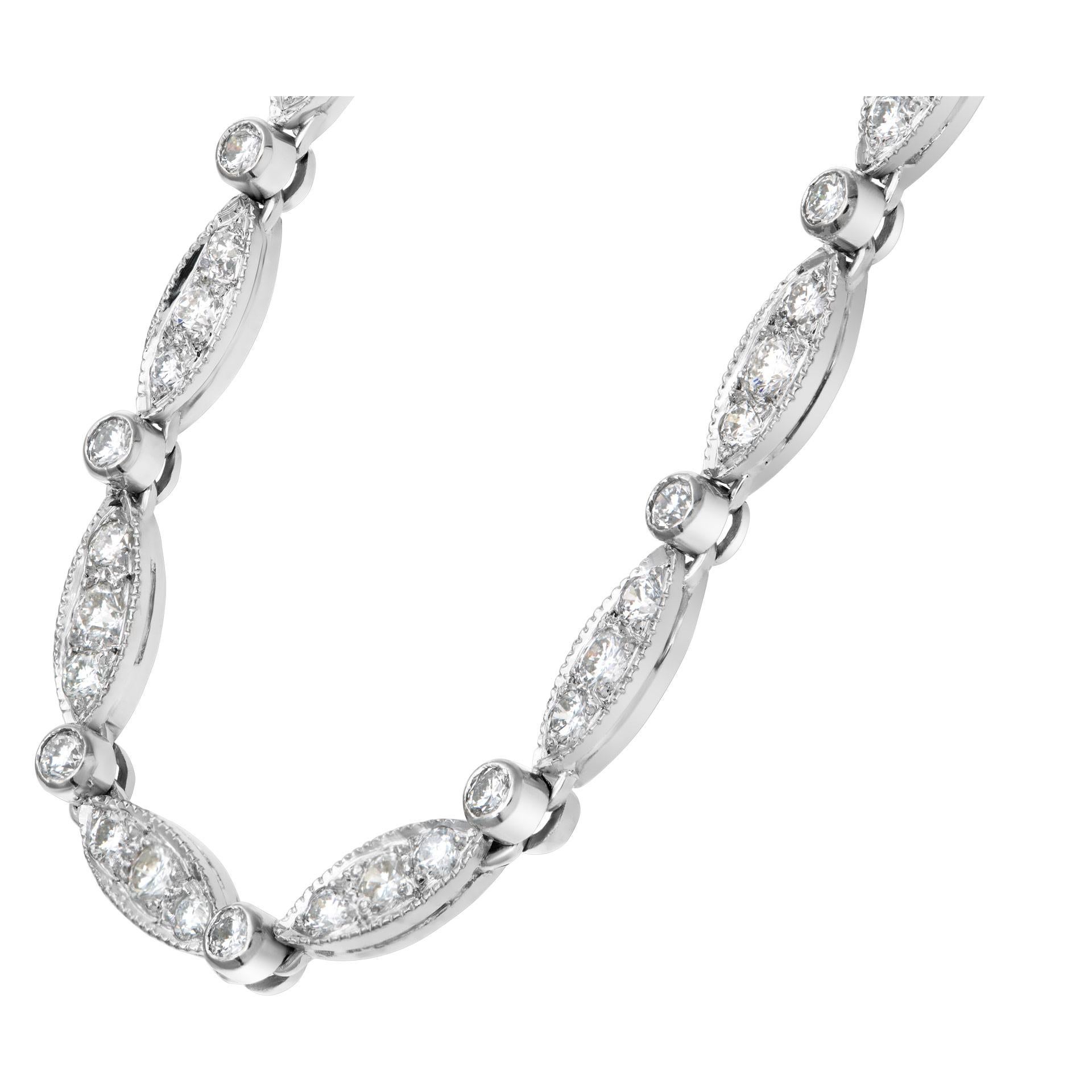 Elegant diamond necklace in 18k white gold with approximately over 2 carats in G-H color, VS-SI clarity diamonds. Length 18.75 inches.