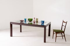 Elegant dining table with mirrored glass top