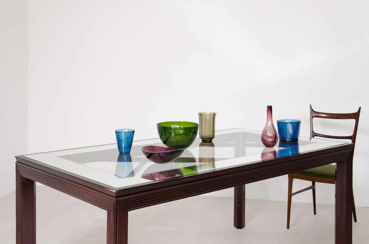 Mid-Century Modern Elegant dining table with mirrored glass top For Sale