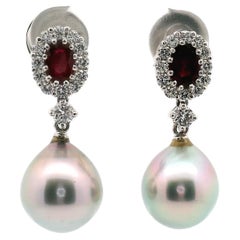 Eleganti orecchini a goccia con perle, rubini e diamanti