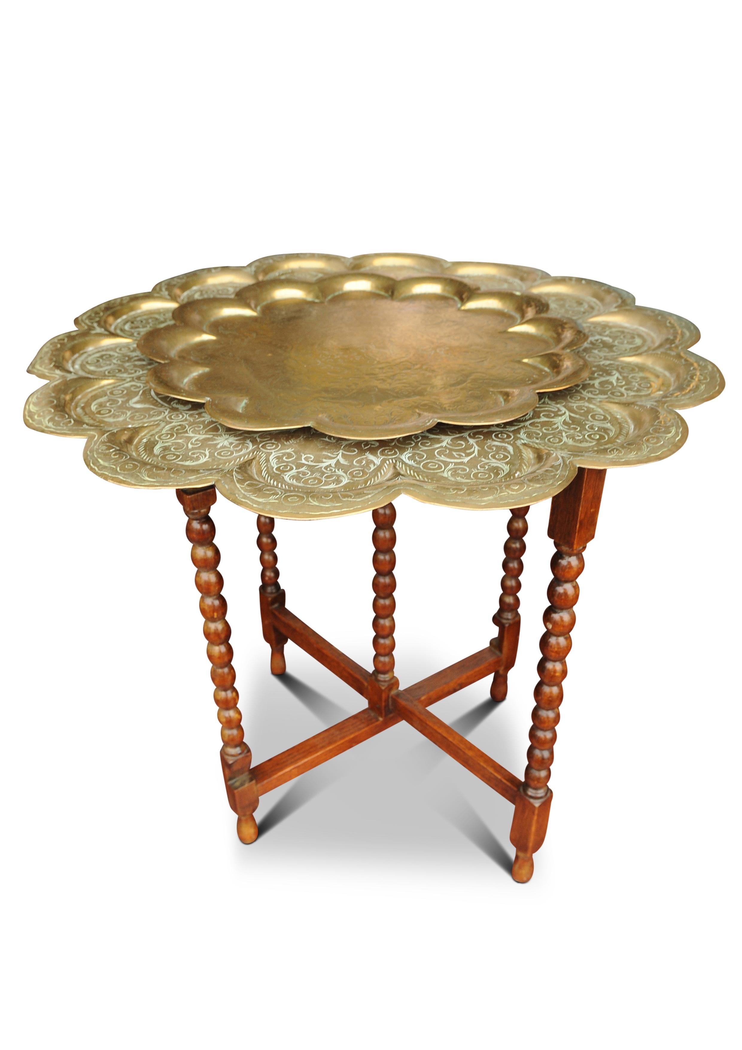 Elegant Eastern Brass Drinks Table With Two Tiered Trays On An Oak Bobbin Base In Good Condition For Sale In Reading, Berkshire