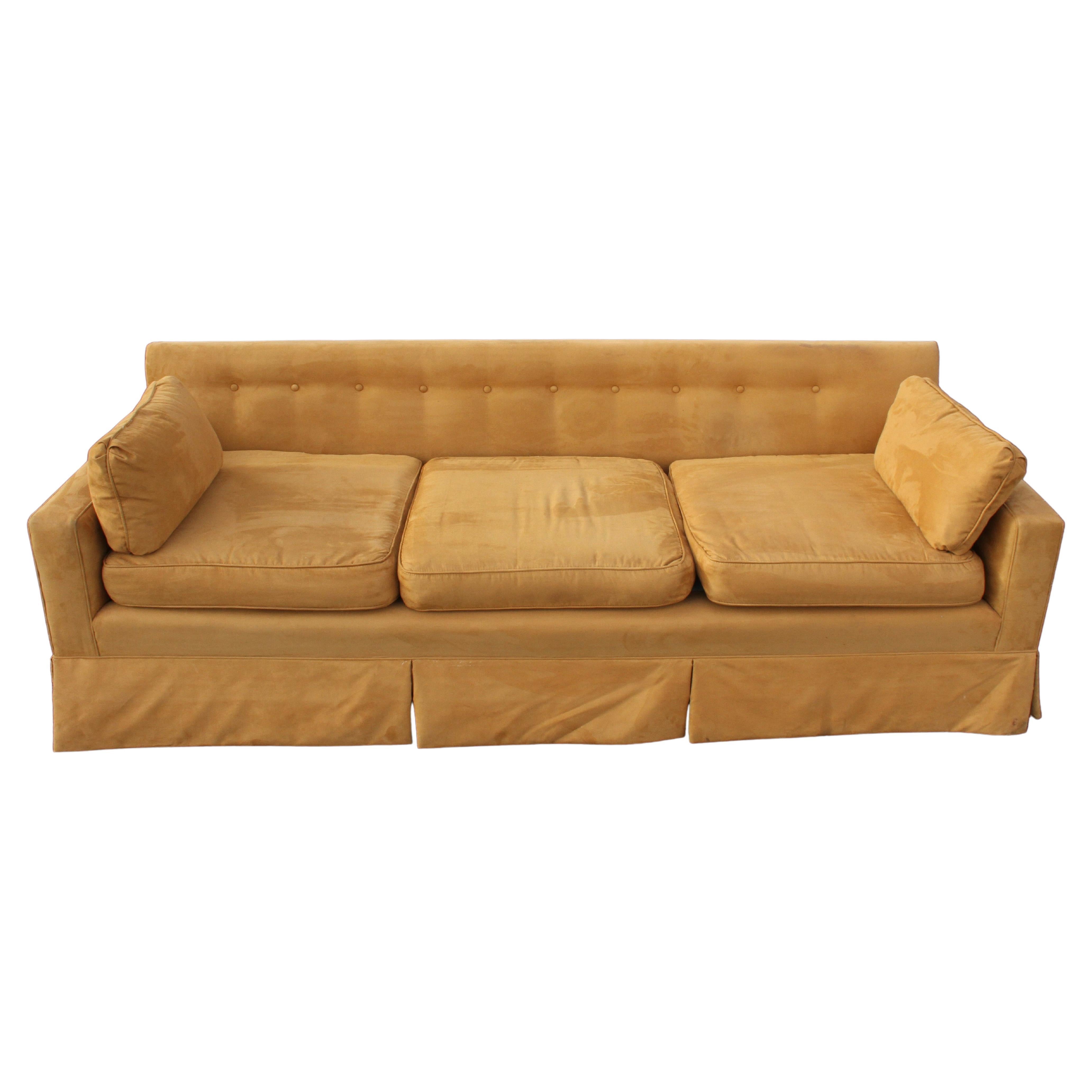 Elegant mid-century Edward Wormley for Dunbar sofa with skirt, on sculpted mahogany legs. You can't beat the quality of a Dunbar sofa, built to last. 
Both Sofas have older reupholstery with newer new foam, Both are in need of reupholstery again.