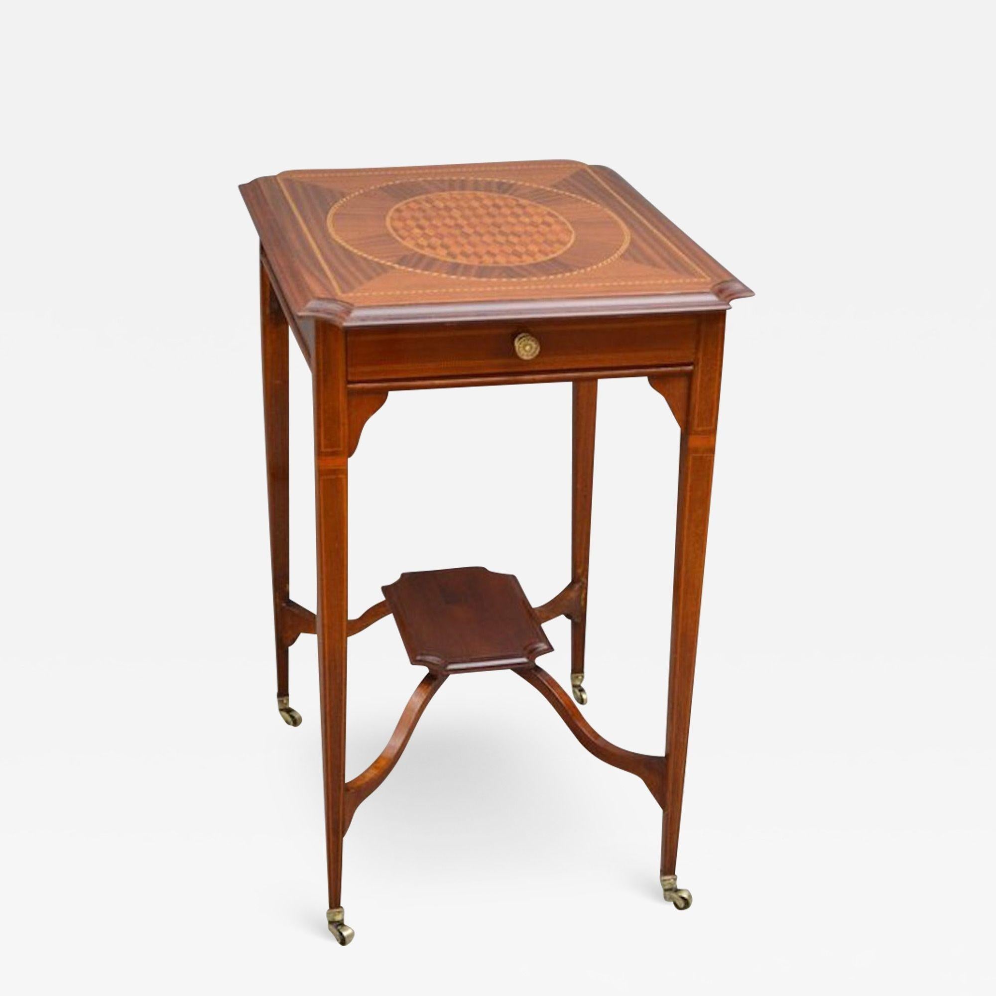 Sn3893 A very attractive Edwardian, mahogany table, having shaped top with geometrically inlaid top, practical frieze drawer and string inlaid legs united by undertier, all in wonderful condition throughout, ready to place at home. c1910
H28.5