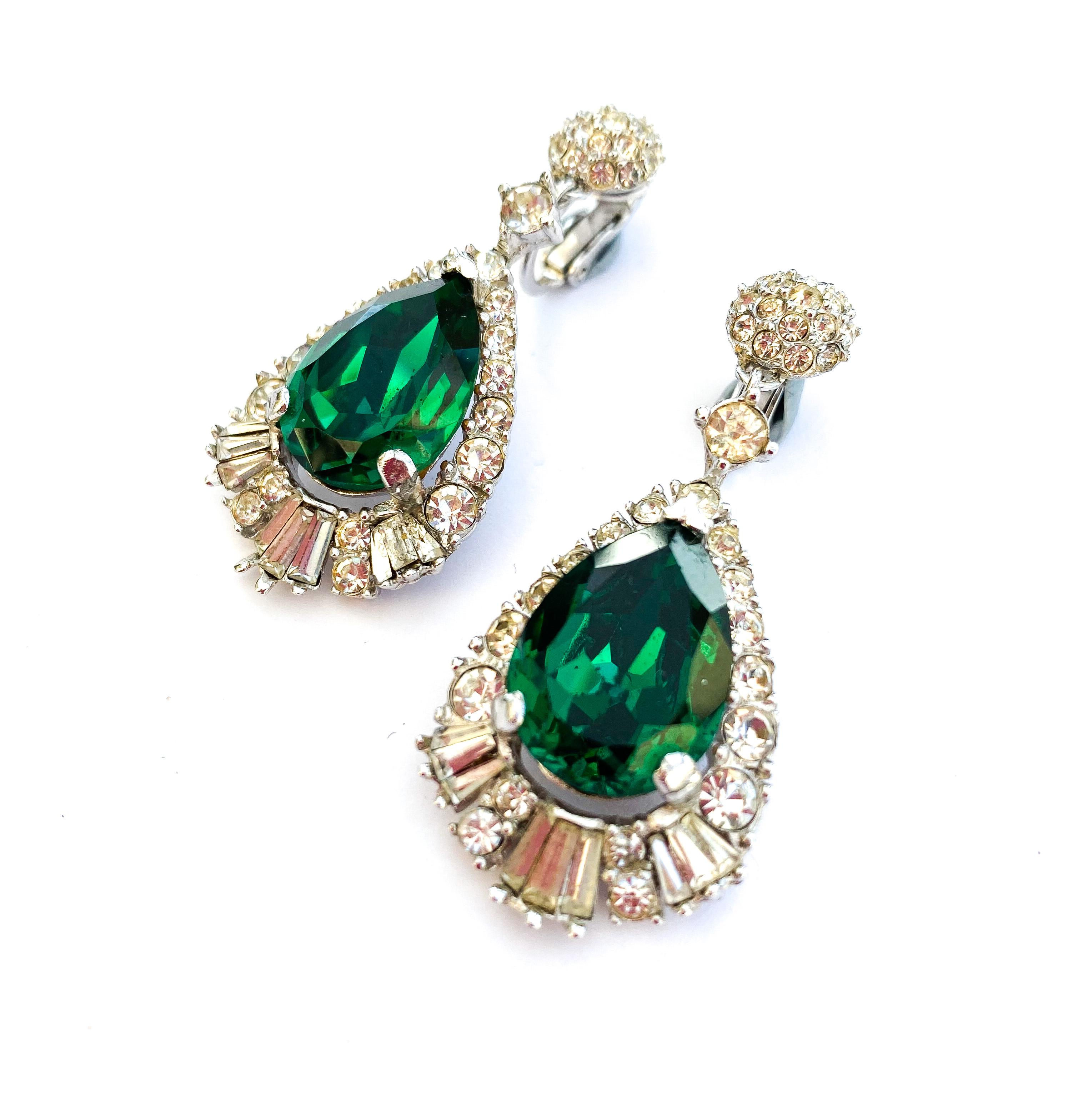 A pair of beautiful clear paste and faux emerald drop earrings by Marcel Boucher, from the 1960s. As in many of Boucher's creations, these copy real jewellery designs, reminiscent of Cartier (for whom Boucher worked) or Van Cleef and Arpels, with an