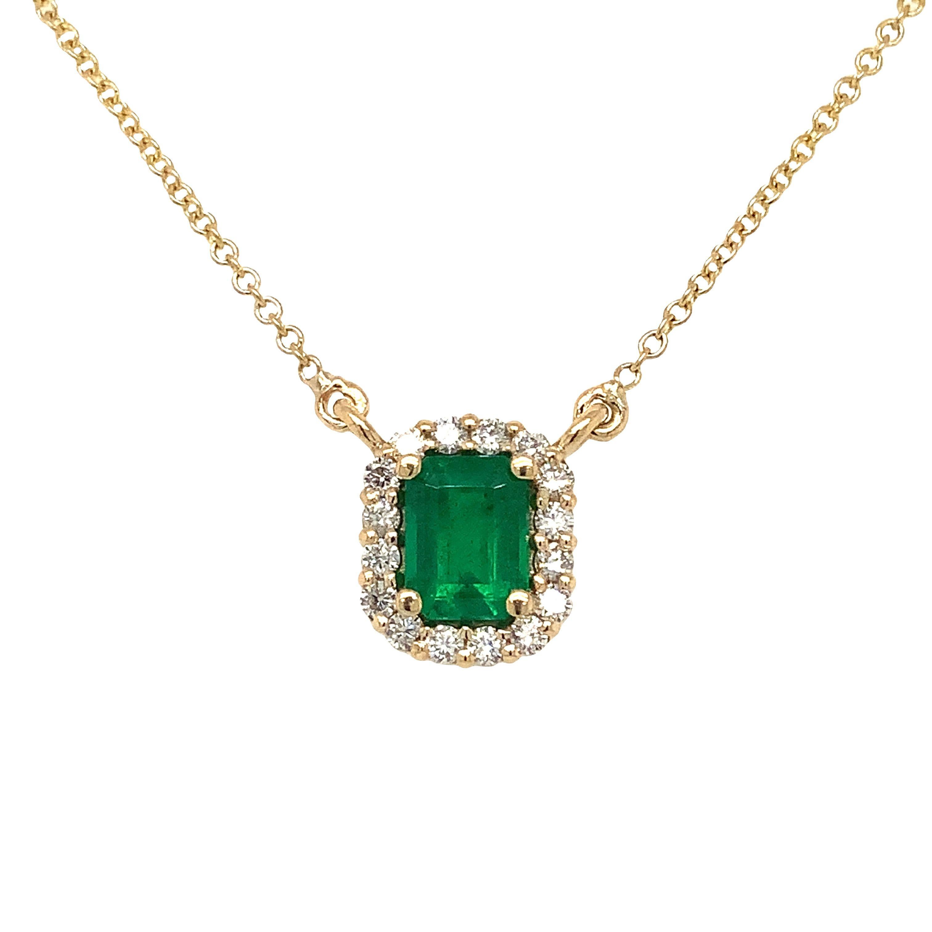  This exquisite necklace set is crafted from luxurious 18K yellow gold, showcasing a Colombian Emerald Cut Emerald of 1.07 cts. and a medium to dark green hue. Complemented by 16 Round Brilliant Cut Diamonds of 0.31 cts, G color, and VS2 clarity,