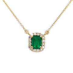 Elegant Emerald and Diamond Necklace Set in 18K Yellow Gold