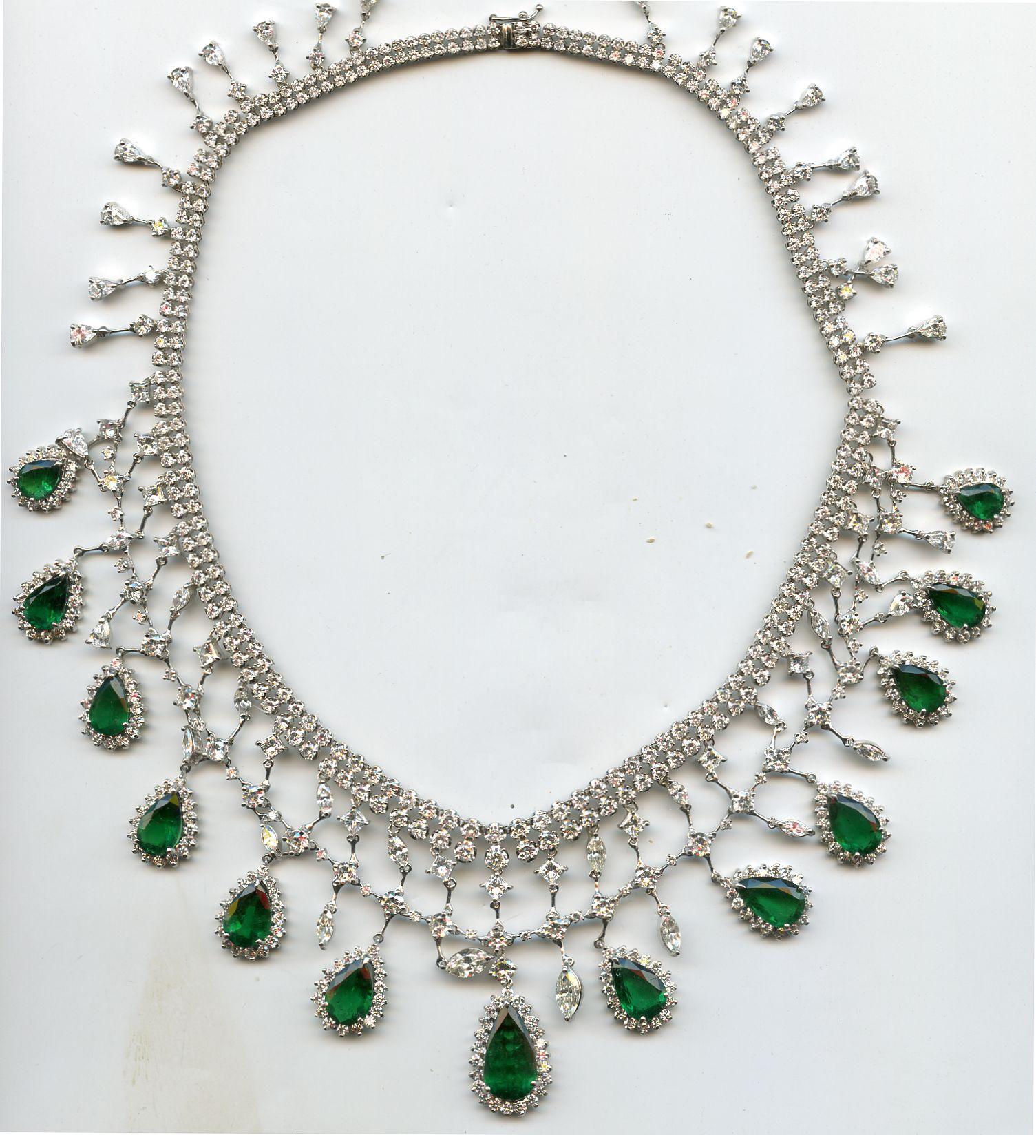 NPSE1- Necklace features a total of 44.07 carats of round, pear, marquise, and princess shape white diamonds. Also, the center emeralds add a total of 38.80 carats. Mounted in white gold, this necklace has been made to make a statement. 