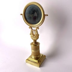 Elegant Empire Table Mirror in Gilded Bronze