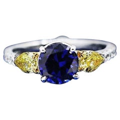 Elegant Engagement Ring with 2.00ct Center Blue Sapphire and two Diamonds Elegant Engagement Ring with 2.00ct Center Blue Sapphire and two Diamonds