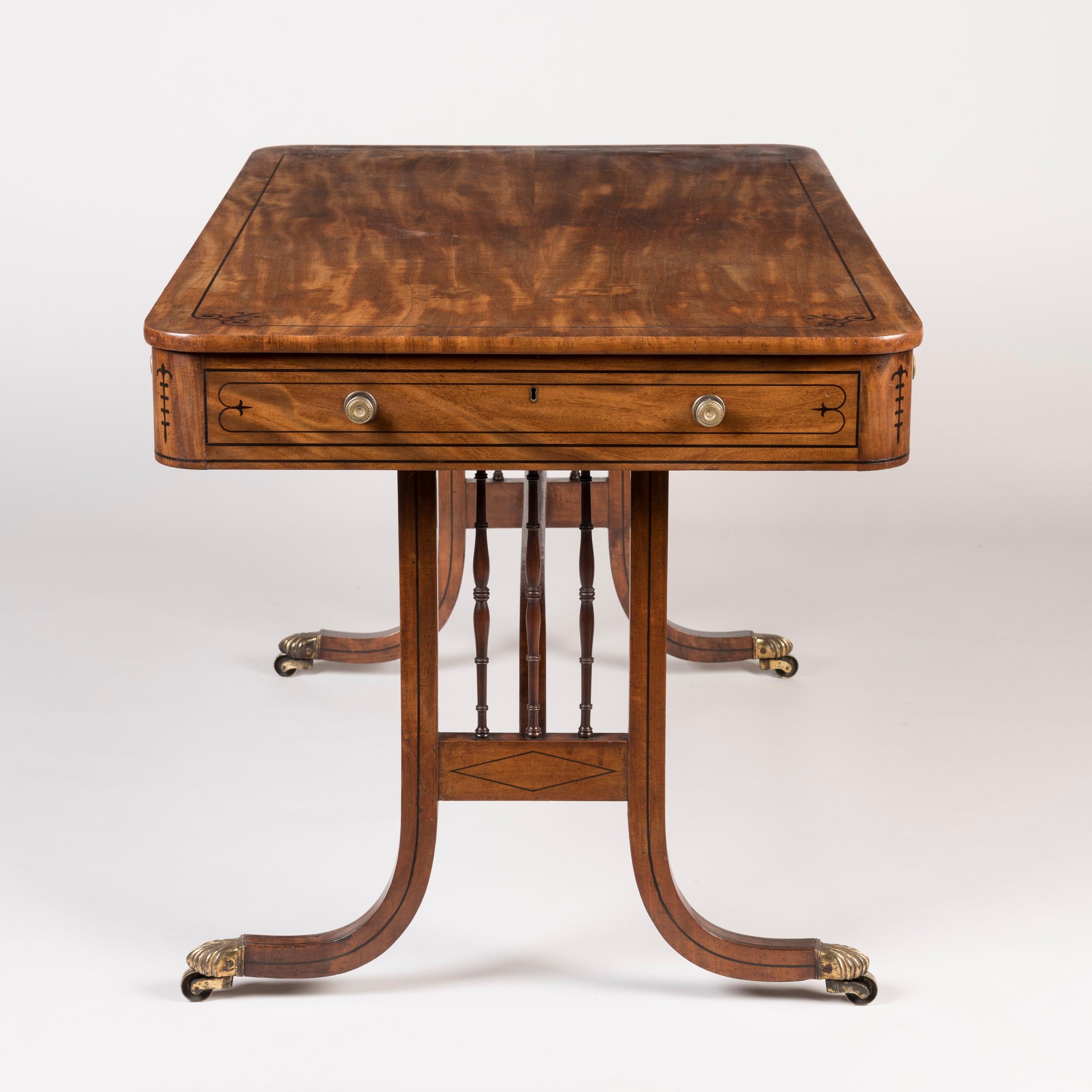Brass Elegant English Regency Period Mahogany Table with Inlaid Details For Sale