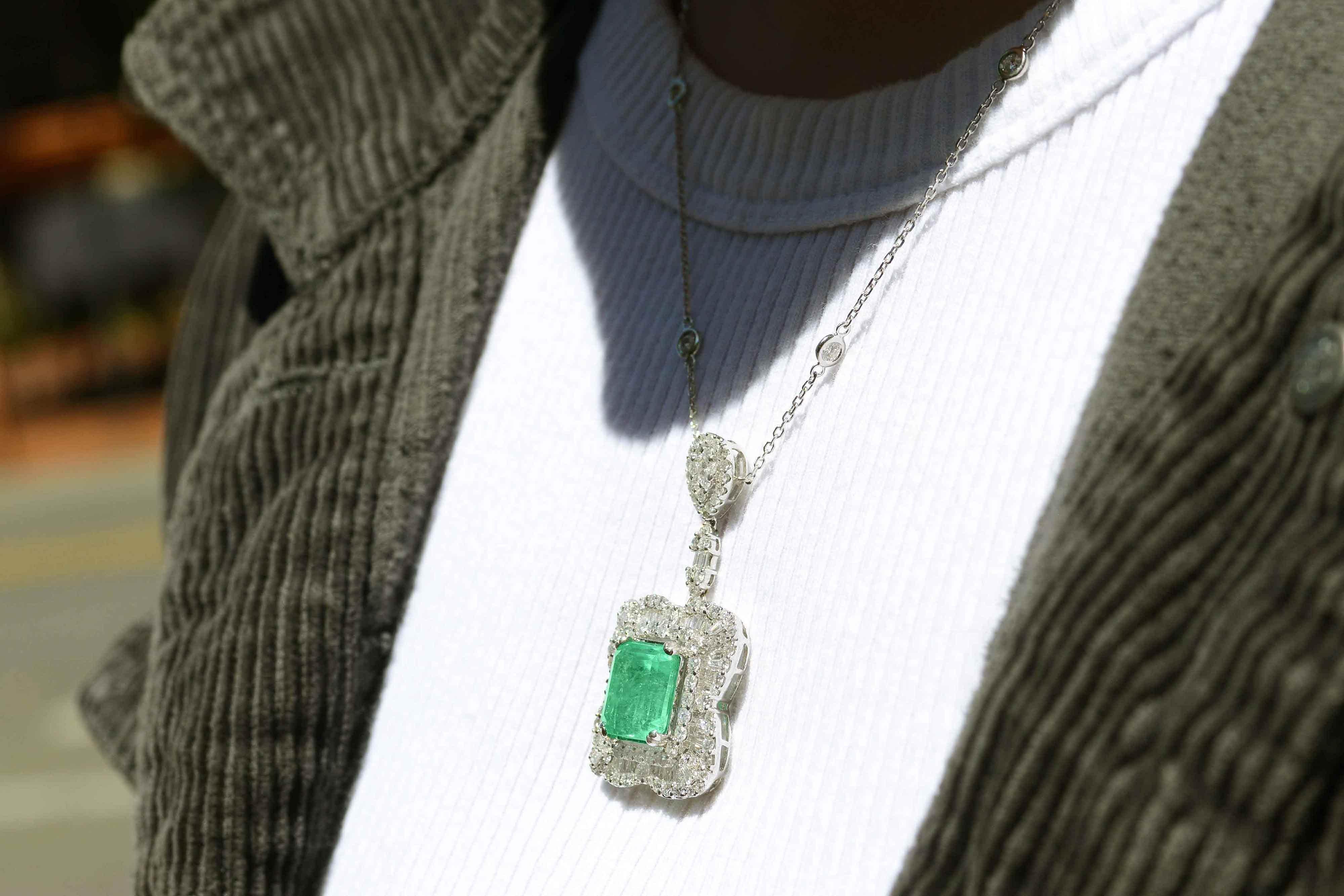 Contemporary Elegant Estate Emerald & Diamond Pendant Necklace Over 10 Carats For Sale