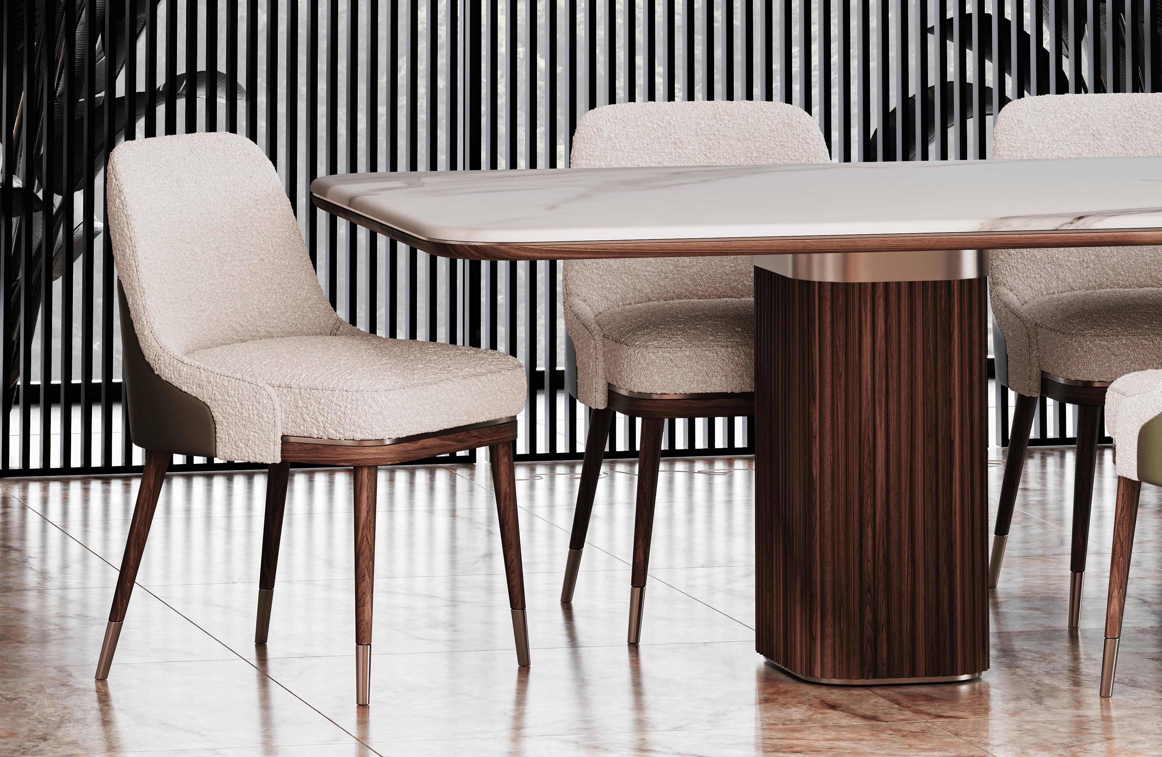 The Evelyn dining chair exudes timeless elegance with its classic design, offering both luxurious comfort and refined style. Its generously padded backrest and deep cushioning provide exceptional support, ensuring a comfortable dining experience