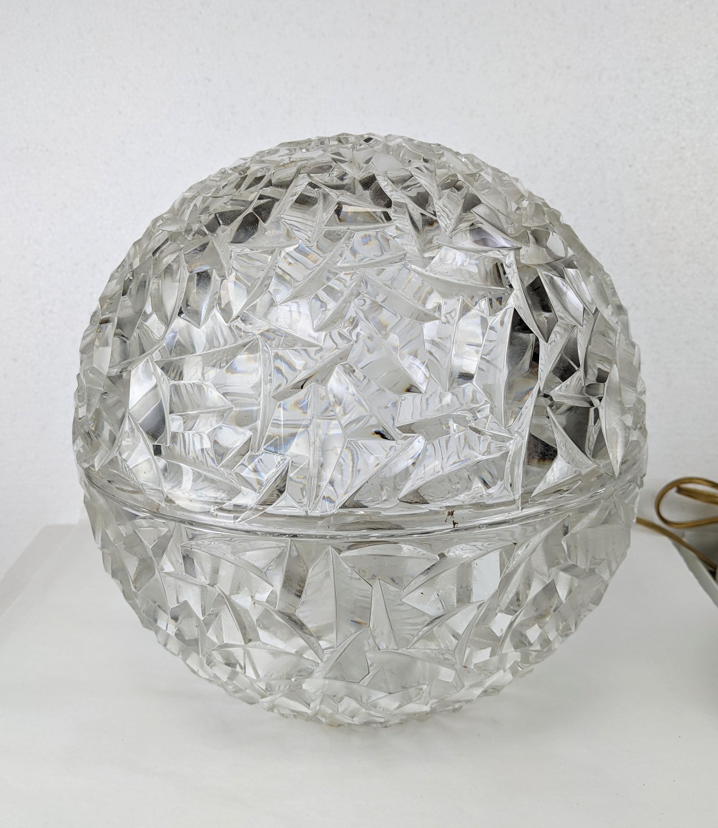 Striking and elegant Faceted crystal globe lamp from the 1950's, likely European. Top comes off for access to change of bulb. Art Deco overtones with the faceted chipped ice look. Heavy quality glass.