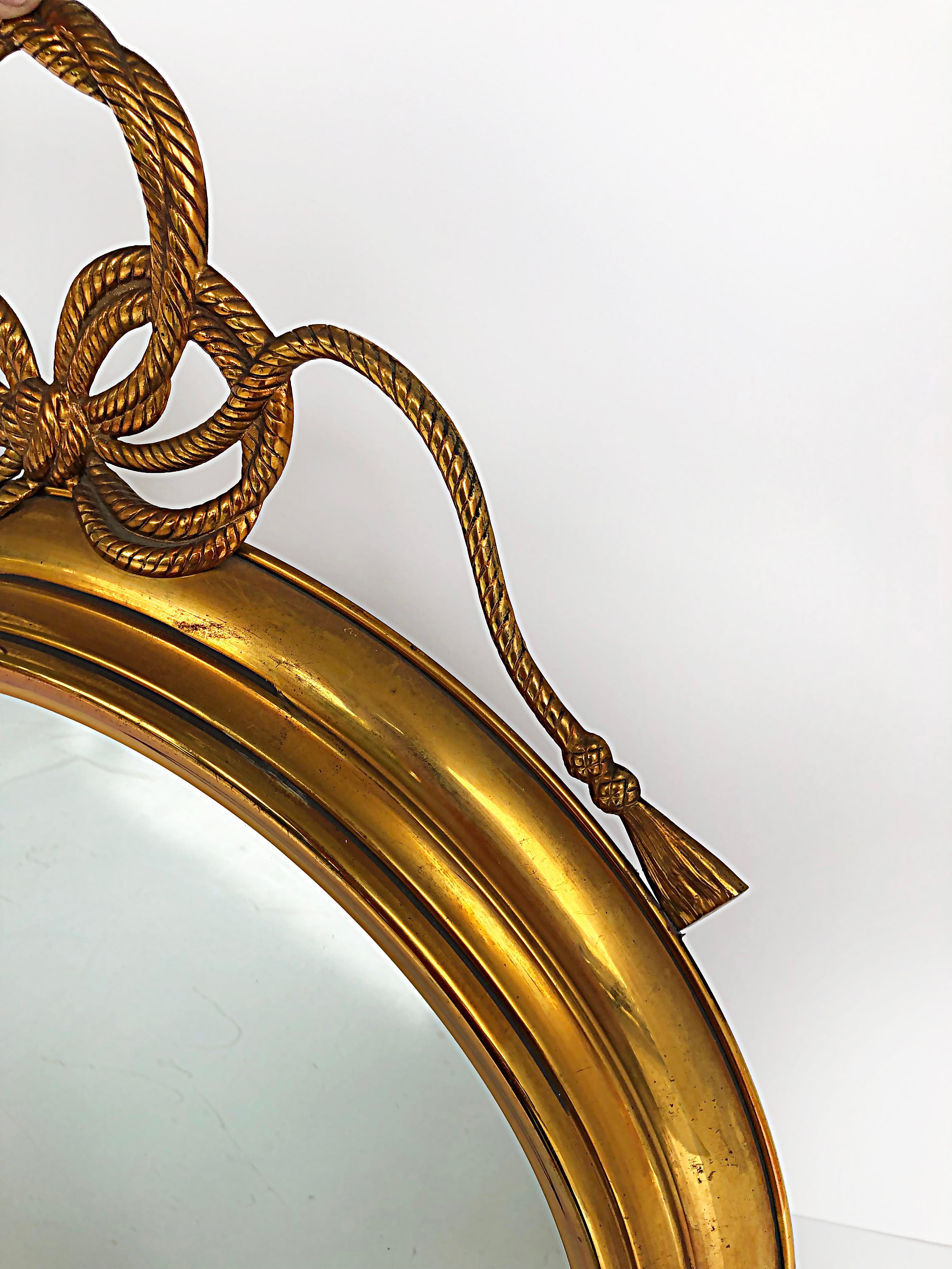 Elegant Fine Quality Brass Wall Mirror, Rope/Tassel Design In Good Condition For Sale In Miami, FL