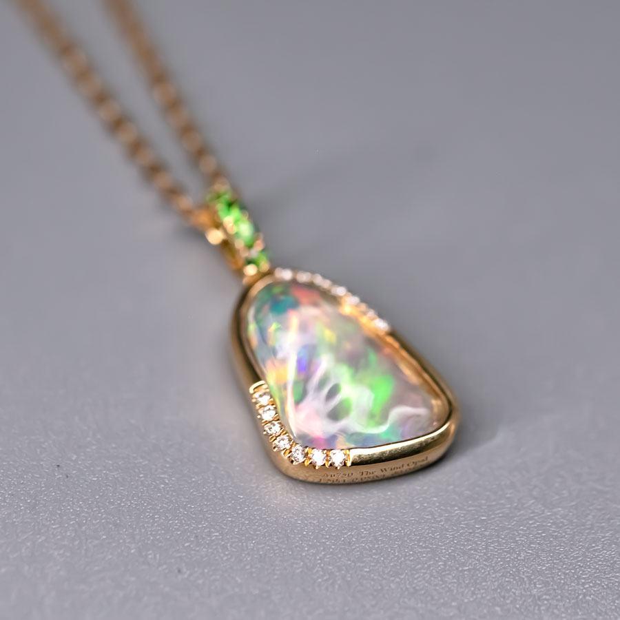 Elegant Mexican Fire Opal, Diamond Tsavorite Pendant Necklace 18K Yellow Gold.


Free Domestic USPS First Class Shipping! Free Gift Bag or Box with every order!

Opal—the queen of gemstones, is one of the most beautiful gemstones in the world. Every