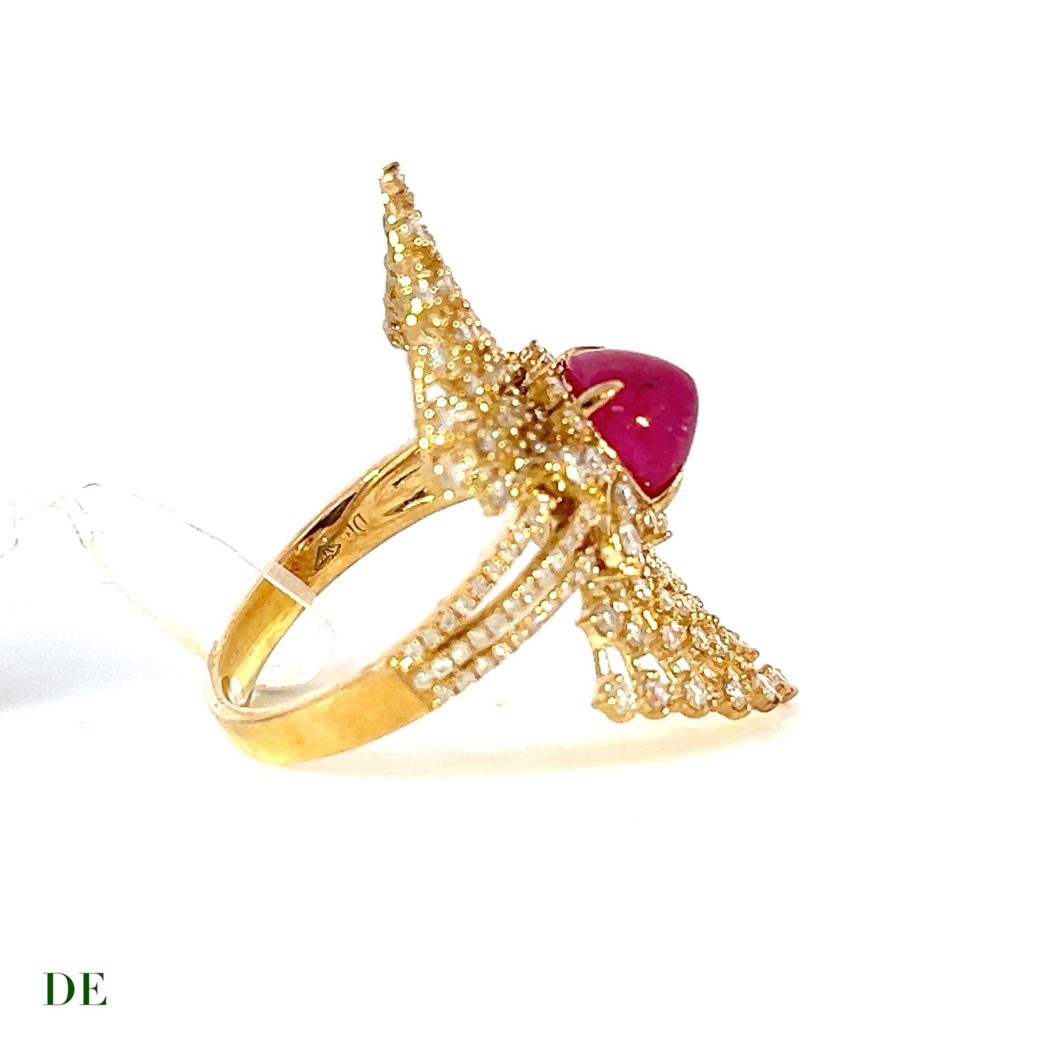 Elegant Firework Natural Cab Vivid Ruby 2.43 ct in 14k 1.17 ct Diamond Band Ring

Introducing the Elegant Firework Natural Cab Vivid Ruby and Diamond Band Ring, a mesmerizing piece that captures the essence of beauty and brilliance. This exquisite